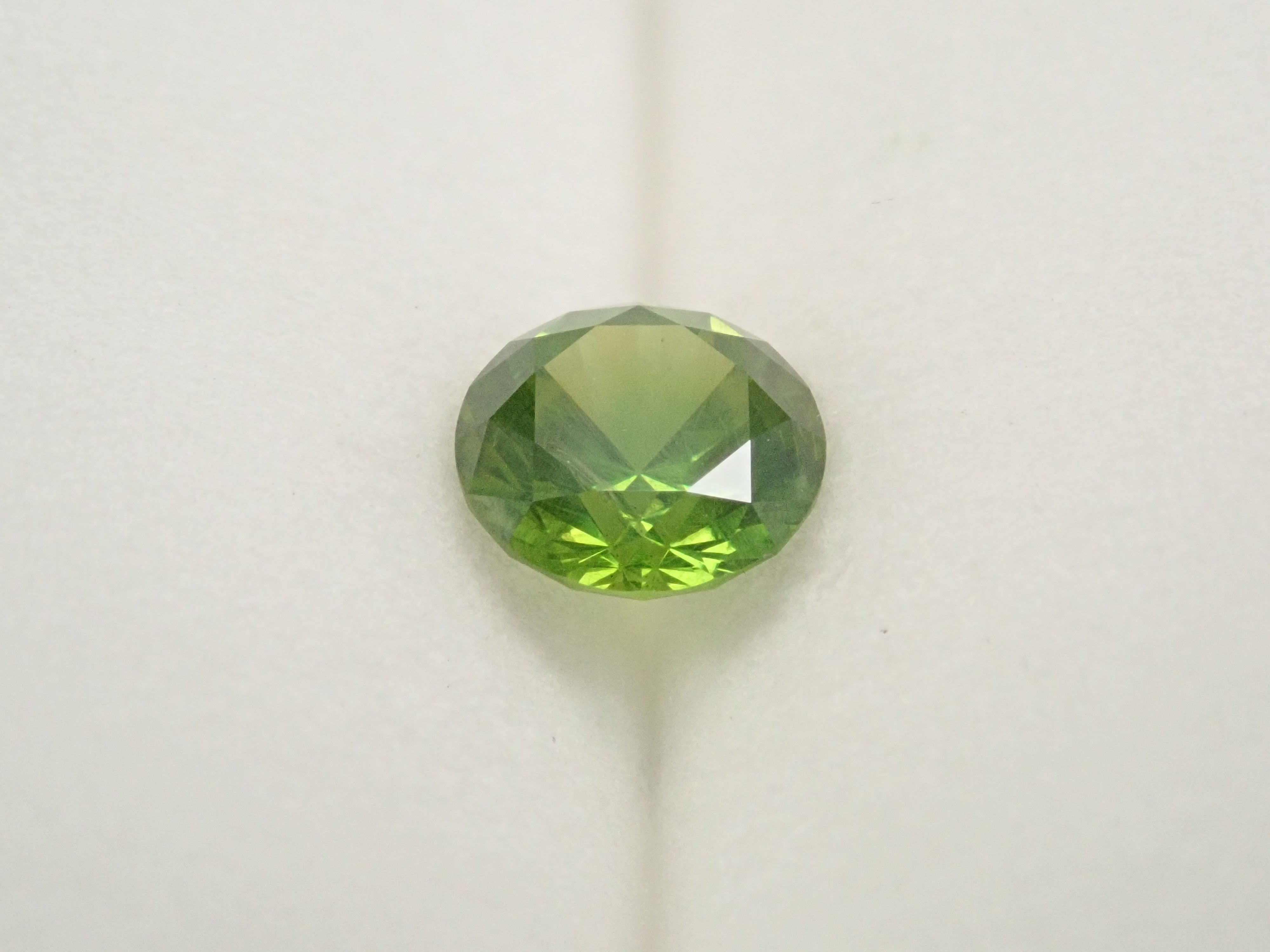 【2/11 22時販売】ロシア産デマントイドガーネット(ホーステール認む) 5.1mm/0.664ctルース