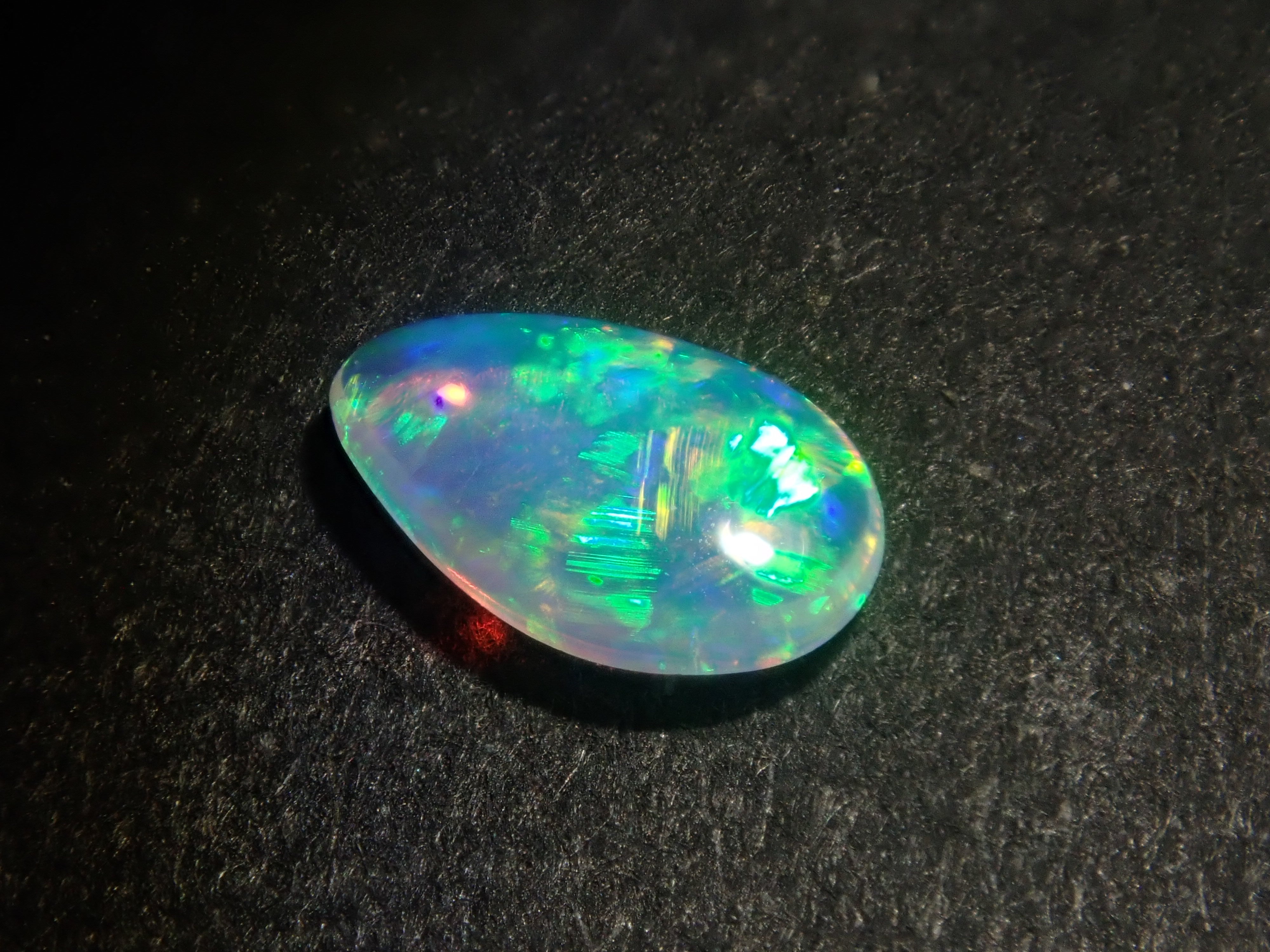 Limited to 2 stones: 1 Australian opal loose stone (pear cut) Multiple purchase discounts available