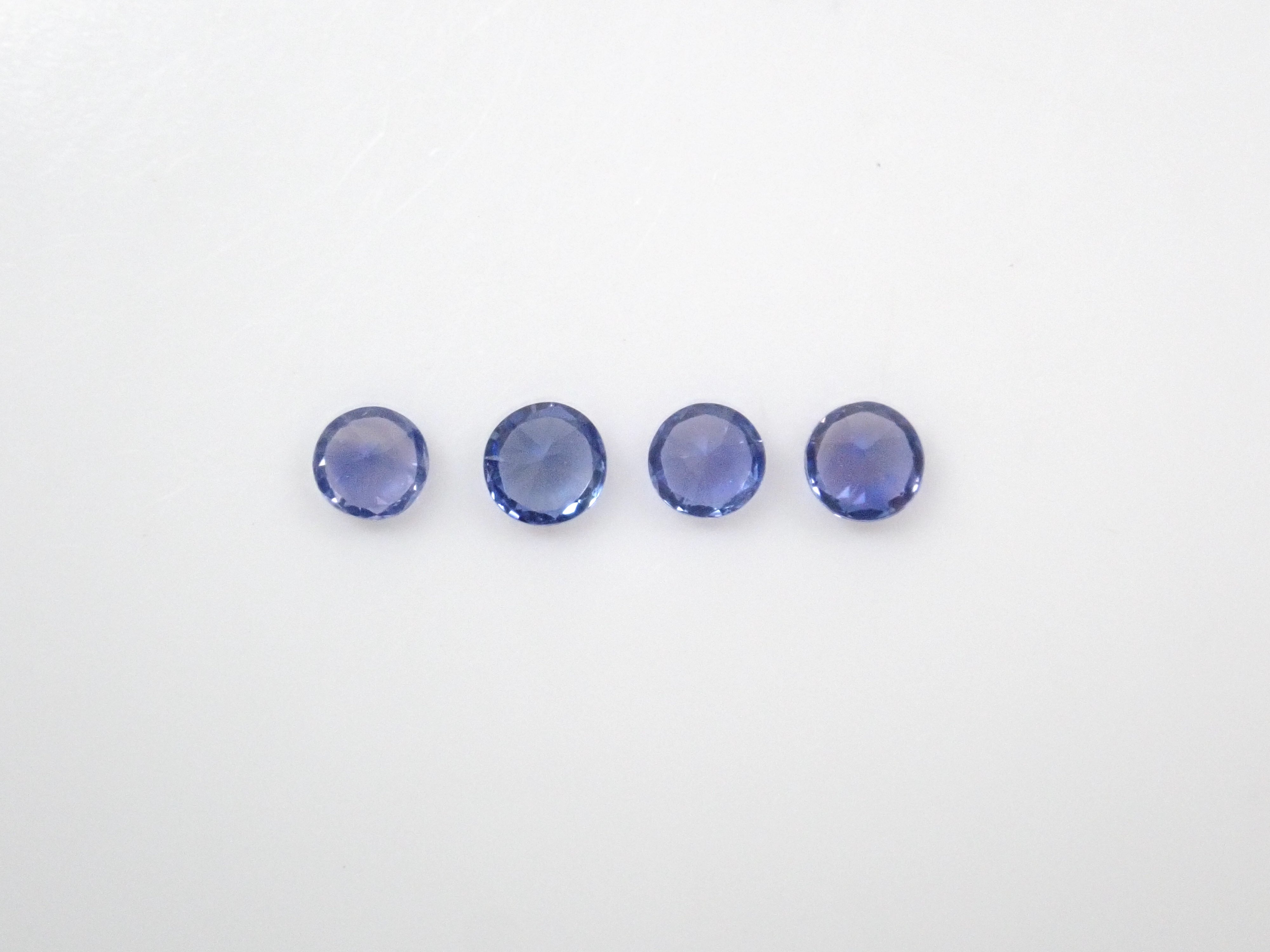 Limited to 4 sets: Sri Lankan sapphire (2.5mm, round cut) and Sri Lankan glass body set of 2 stones. Discounts available for multiple purchases.
