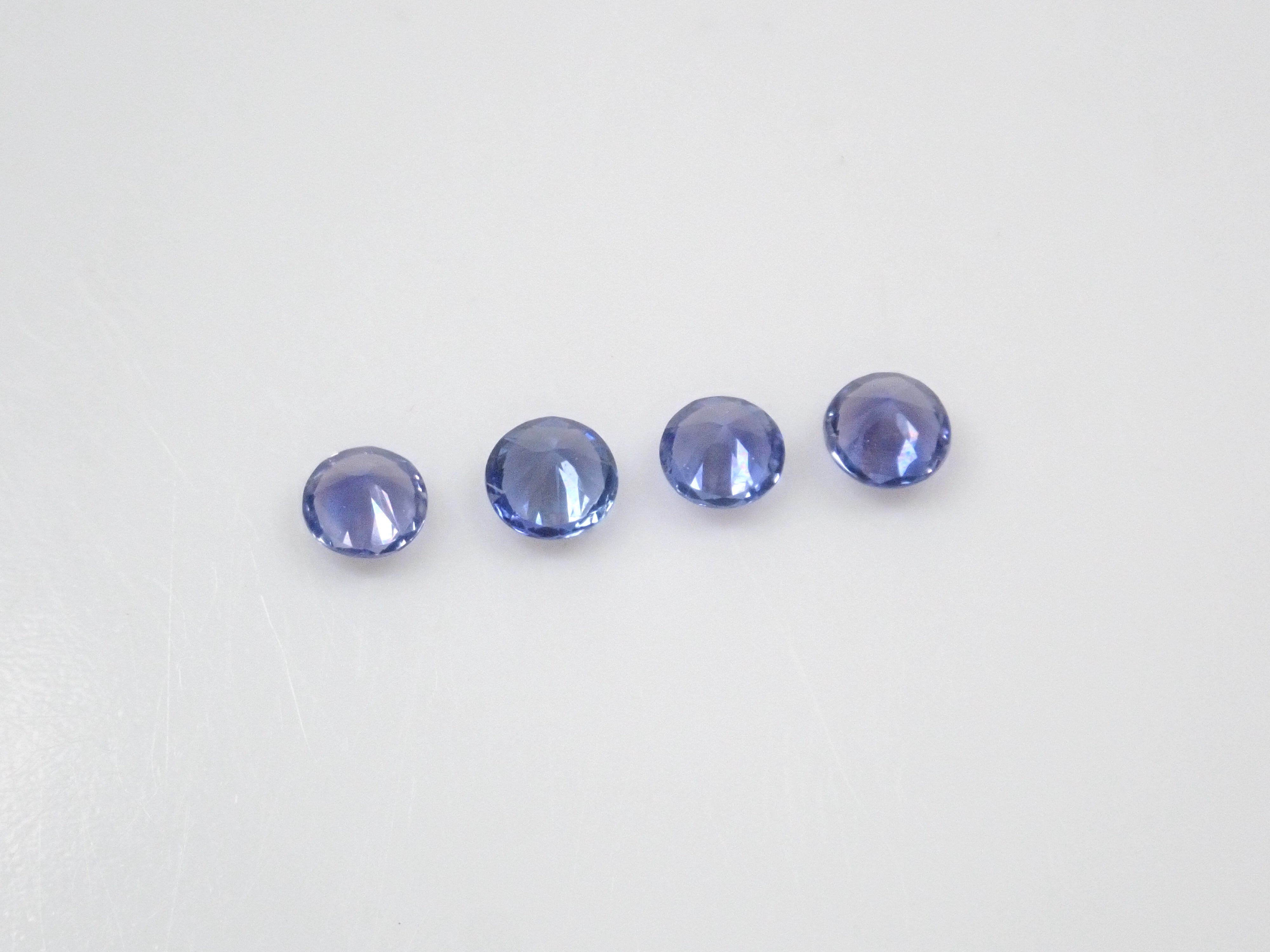 Limited to 4 sets: Sri Lankan sapphire (2.5mm, round cut) and Sri Lankan glass body set of 2 stones. Discounts available for multiple purchases.