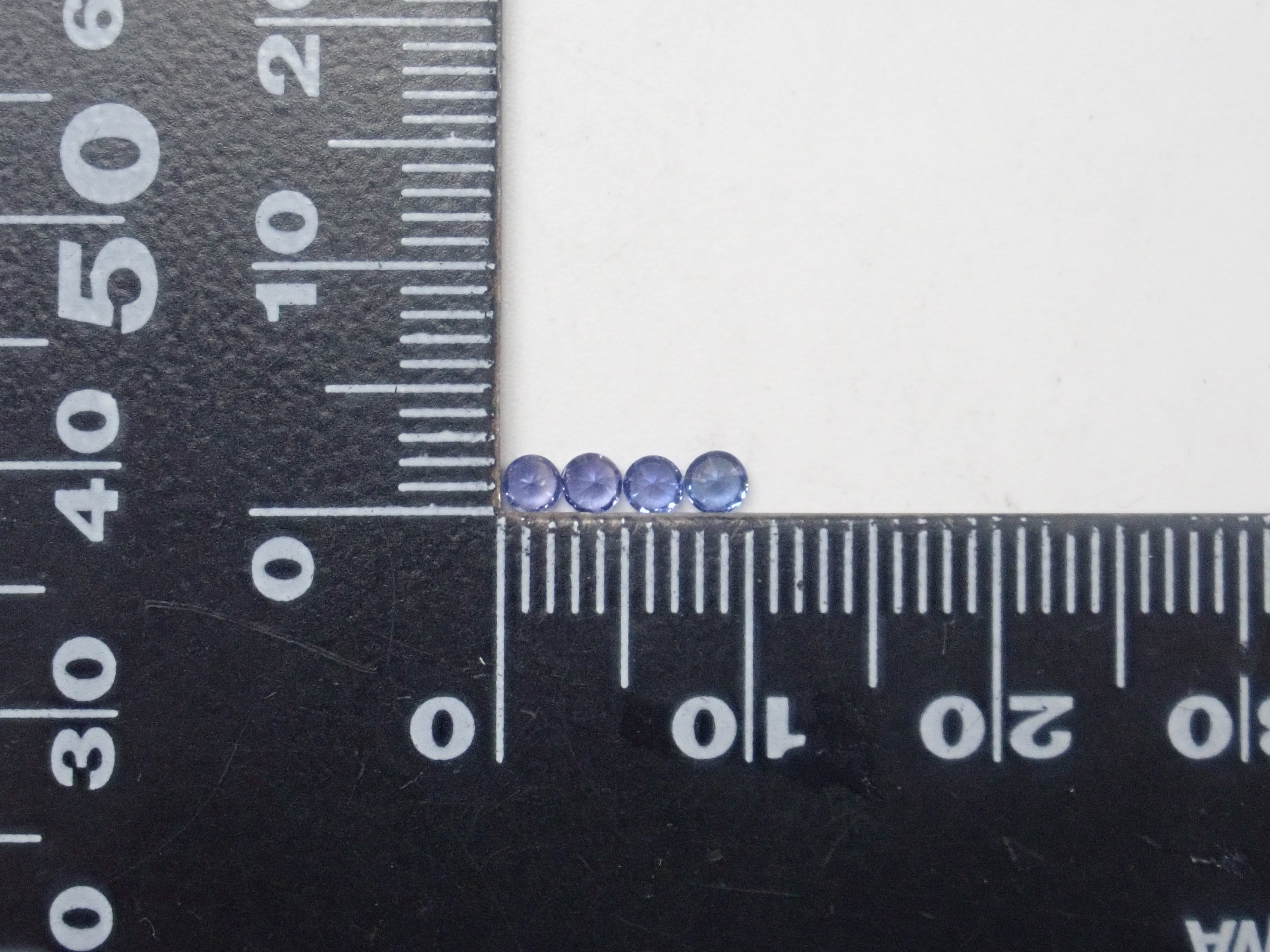 Limited to 4 sets: Sri Lankan sapphire (2.5mm, round cut) and Sri Lankan glass body set of 2 stones. Discounts available for multiple purchases.