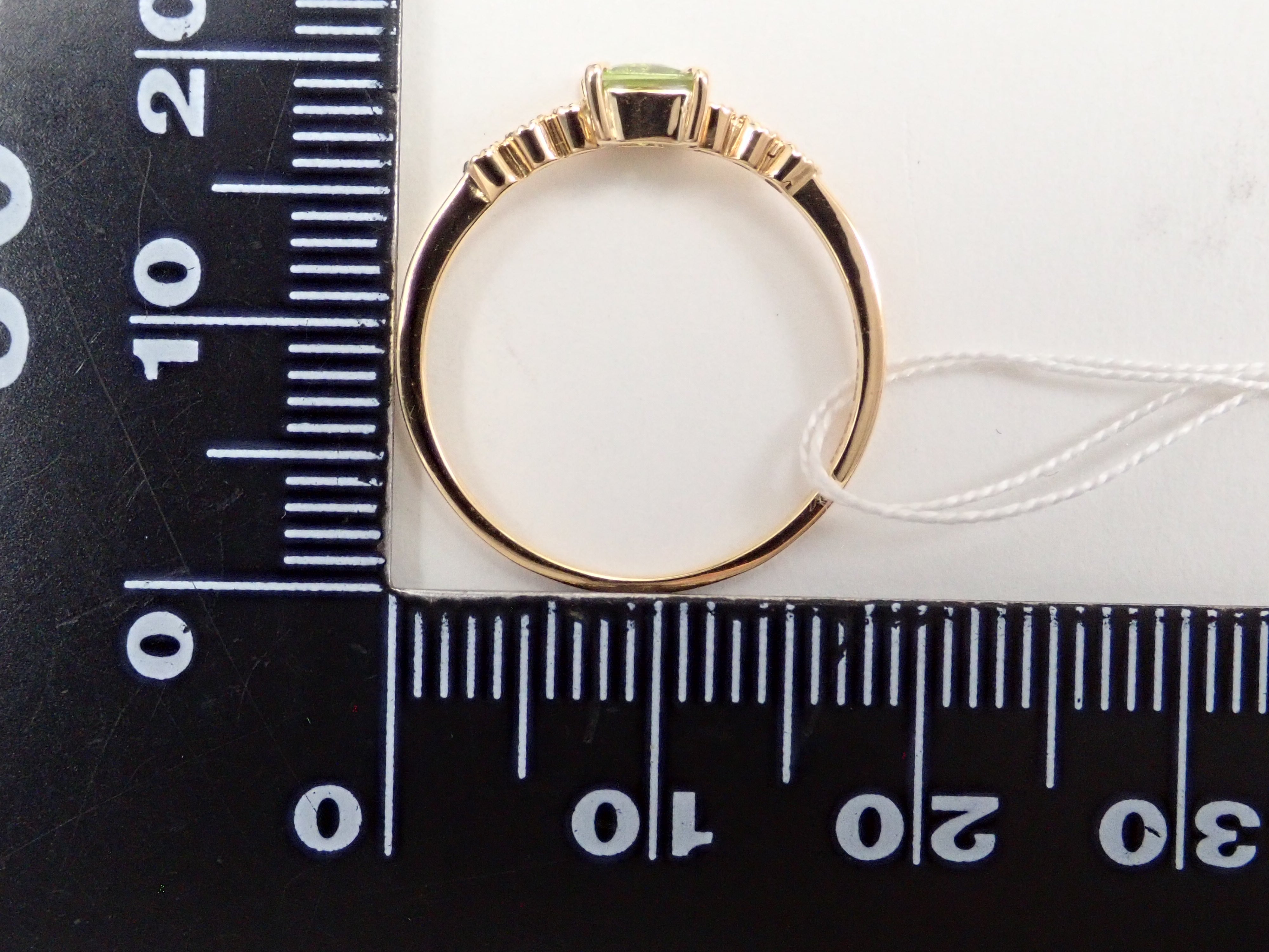 K18YG アメリカ産ペリドット0.339ct・ダイヤモンドリング