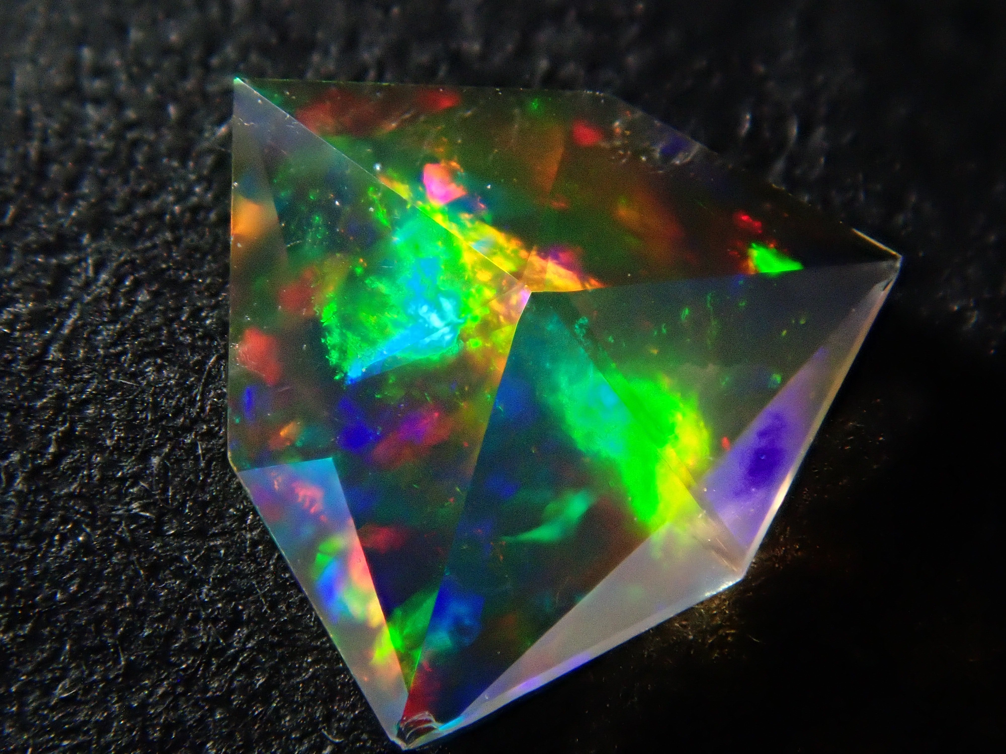 【1/25 22時販売】メキシコ産ファイアオパール 0.191ctルース(ファセットカット)