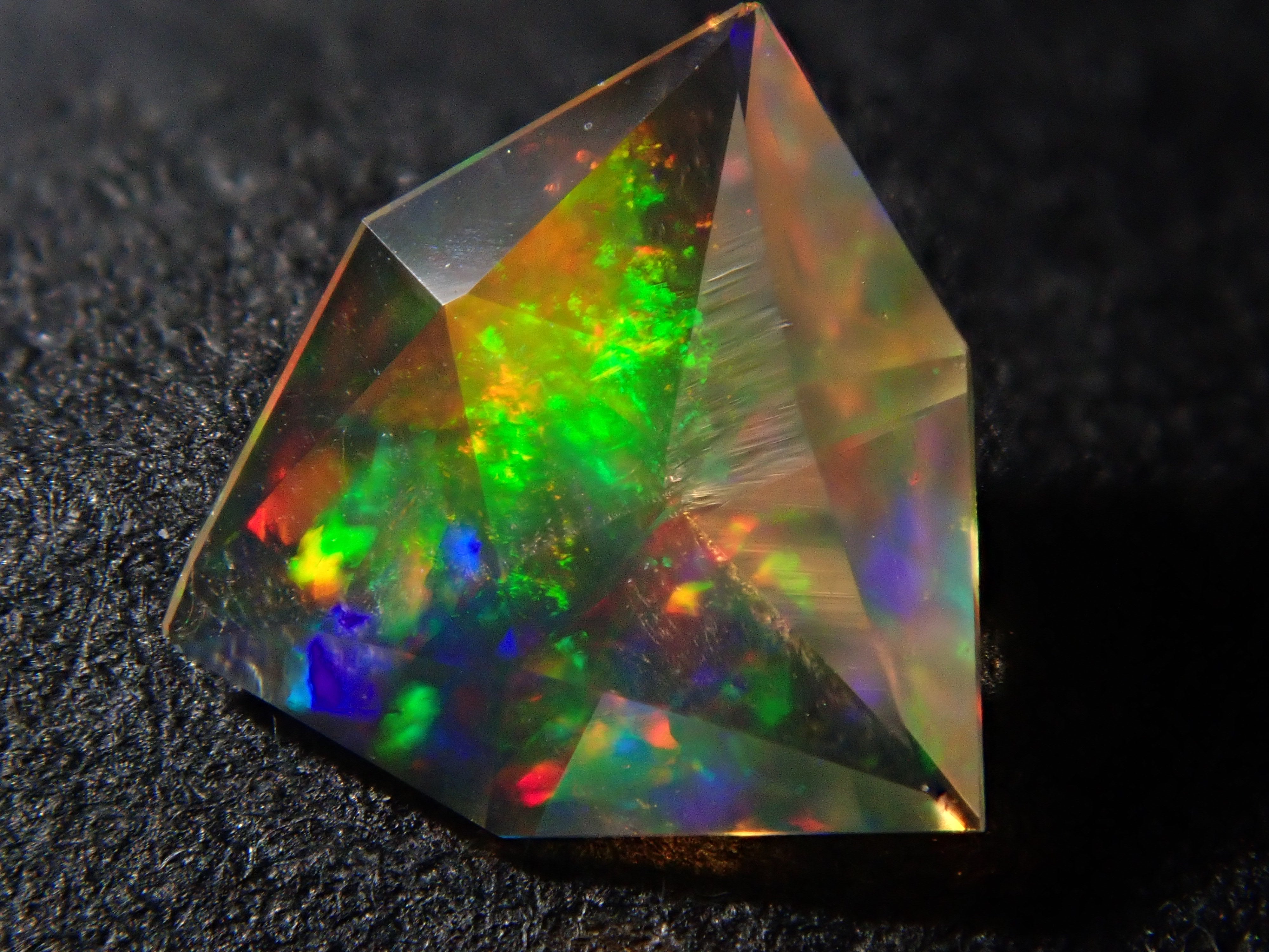 【1/25 22時販売】メキシコ産ファイアオパール 0.191ctルース(ファセットカット)