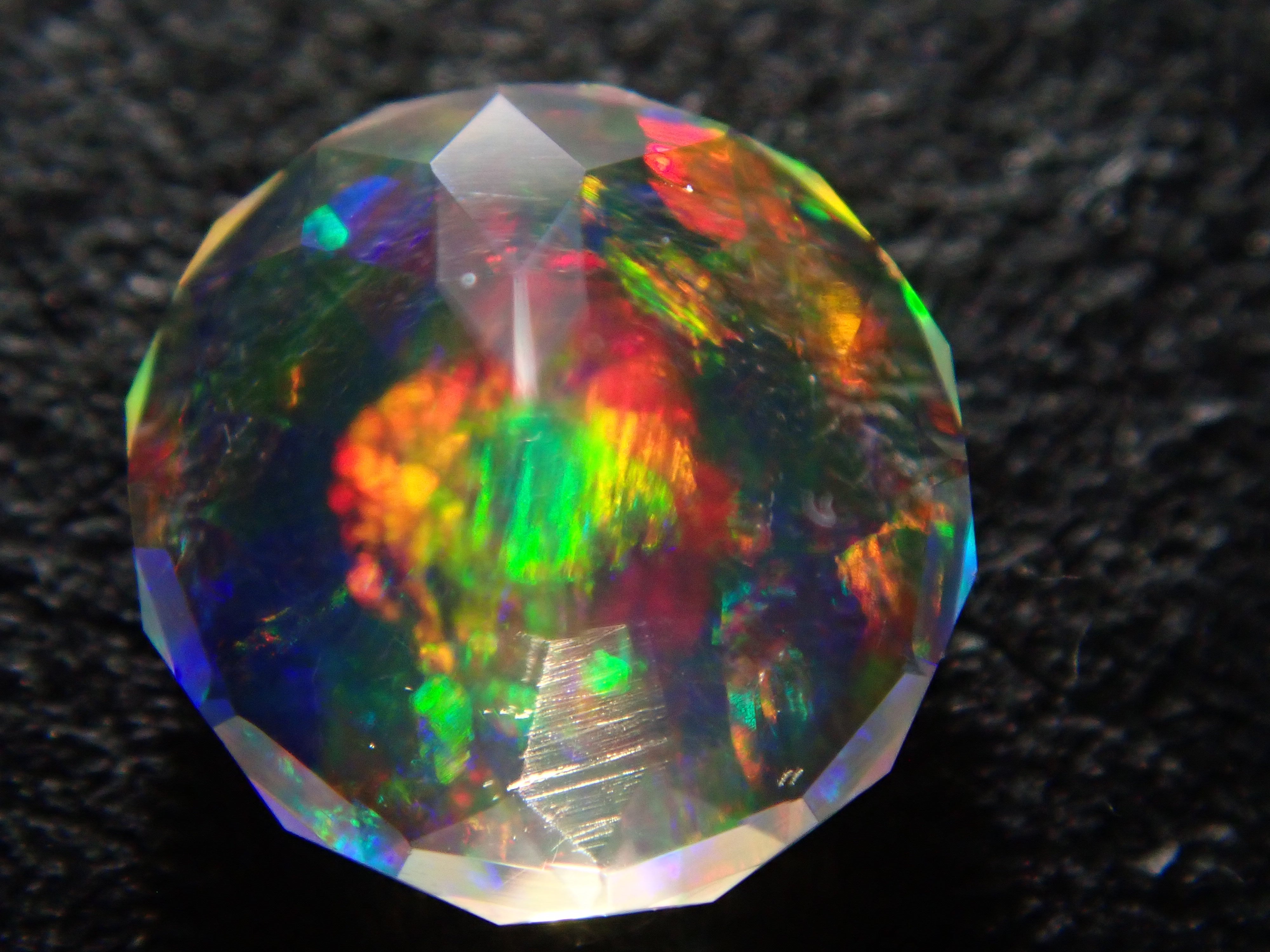 【2/17 22時販売】メキシコ産ファイアオパール(ファセットカット) 4.5mm/0.218ctルース