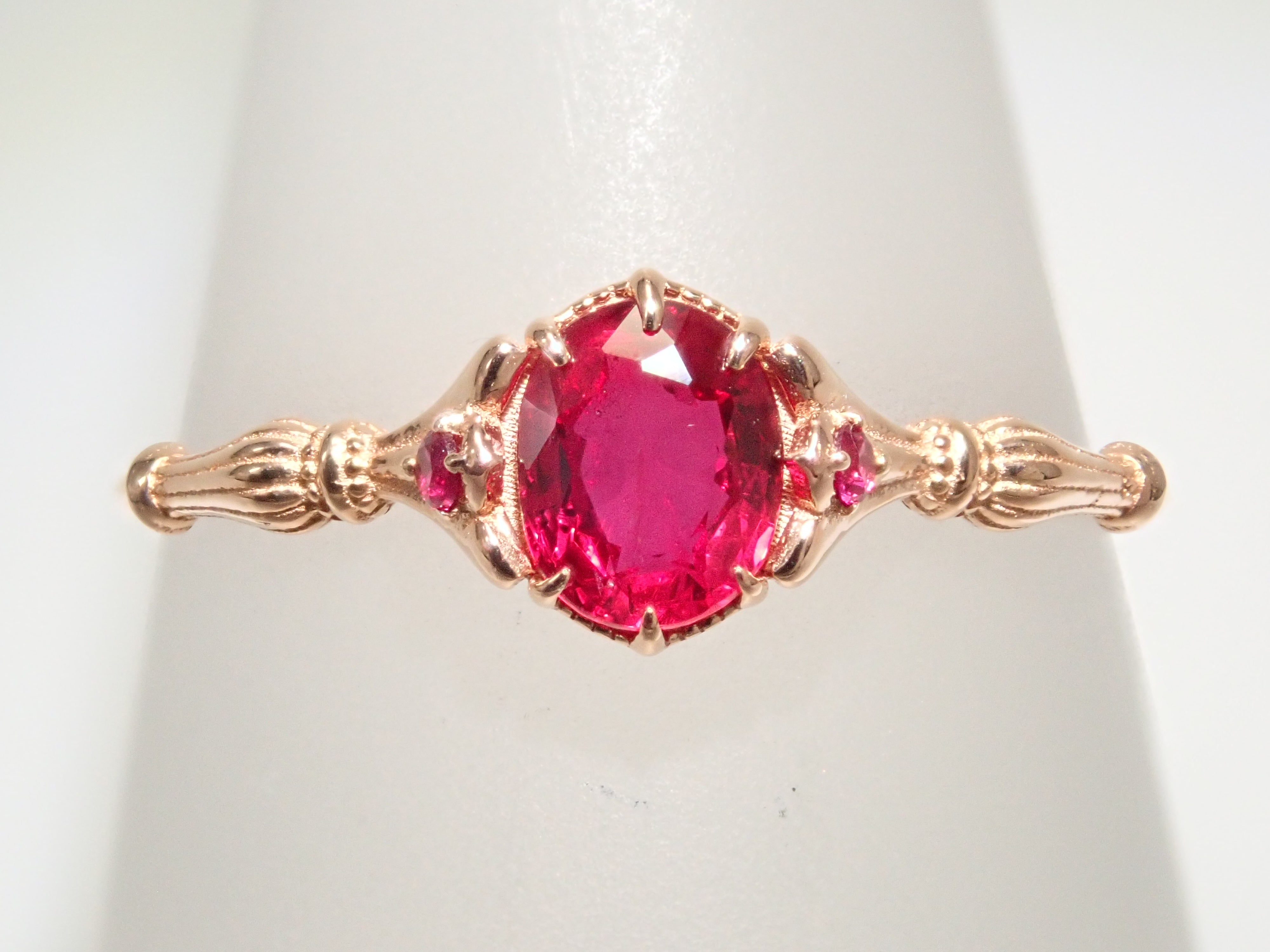 【抽選販売0201_09】K18PG タイ産ピジョンブラッドルビー 0.38ctリング AIGS