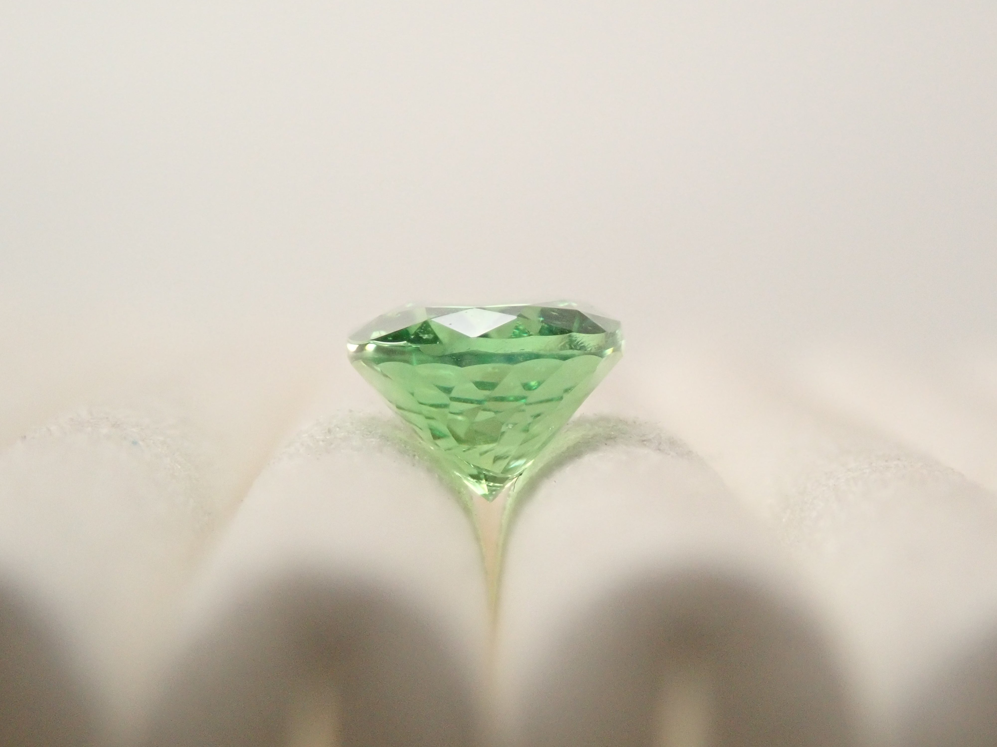 【12561607掲載】タンザニア産バイカラーグロッシュラーガーネット 0.796ctルース