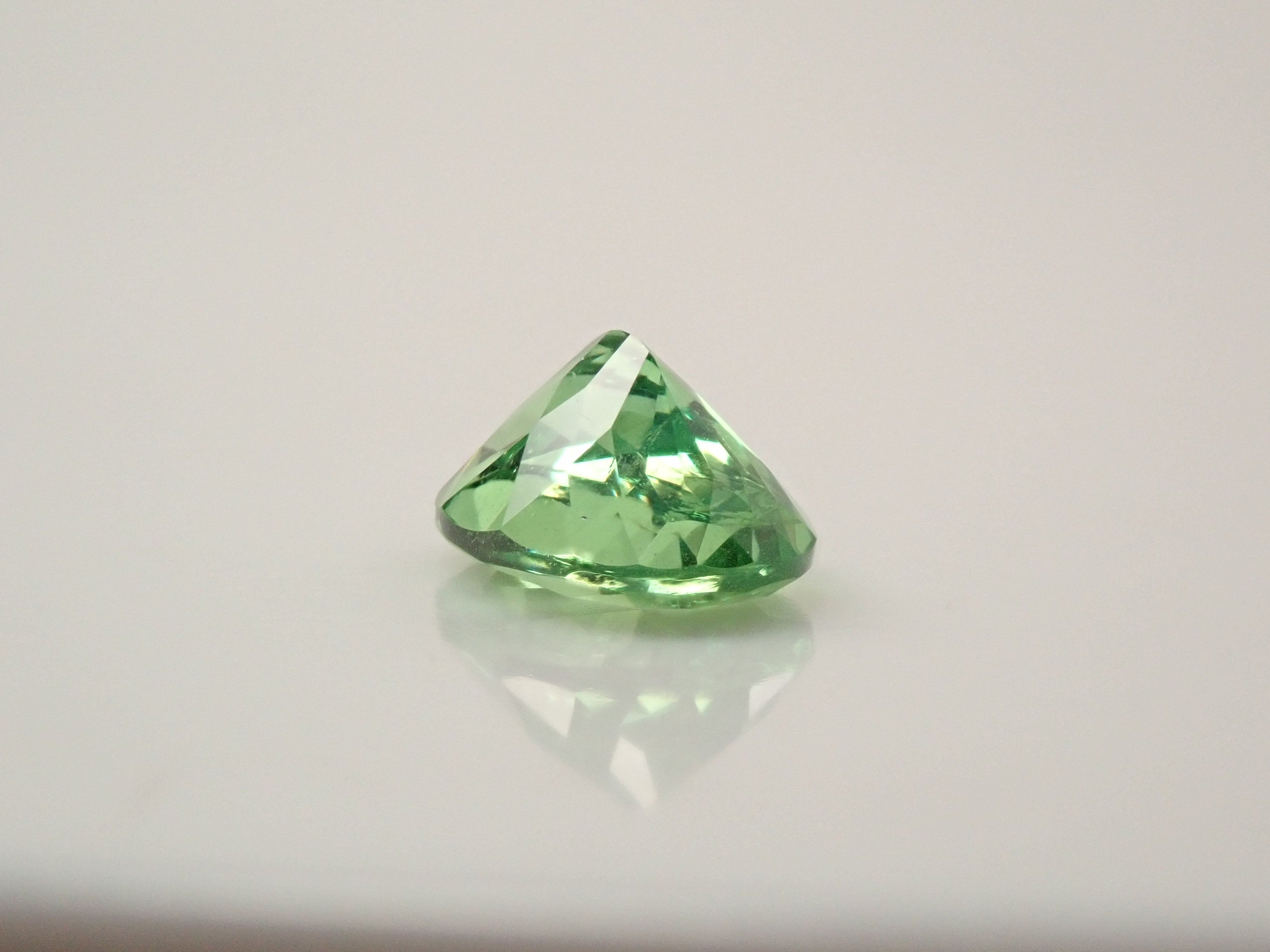 【12561607掲載】タンザニア産バイカラーグロッシュラーガーネット 0.796ctルース