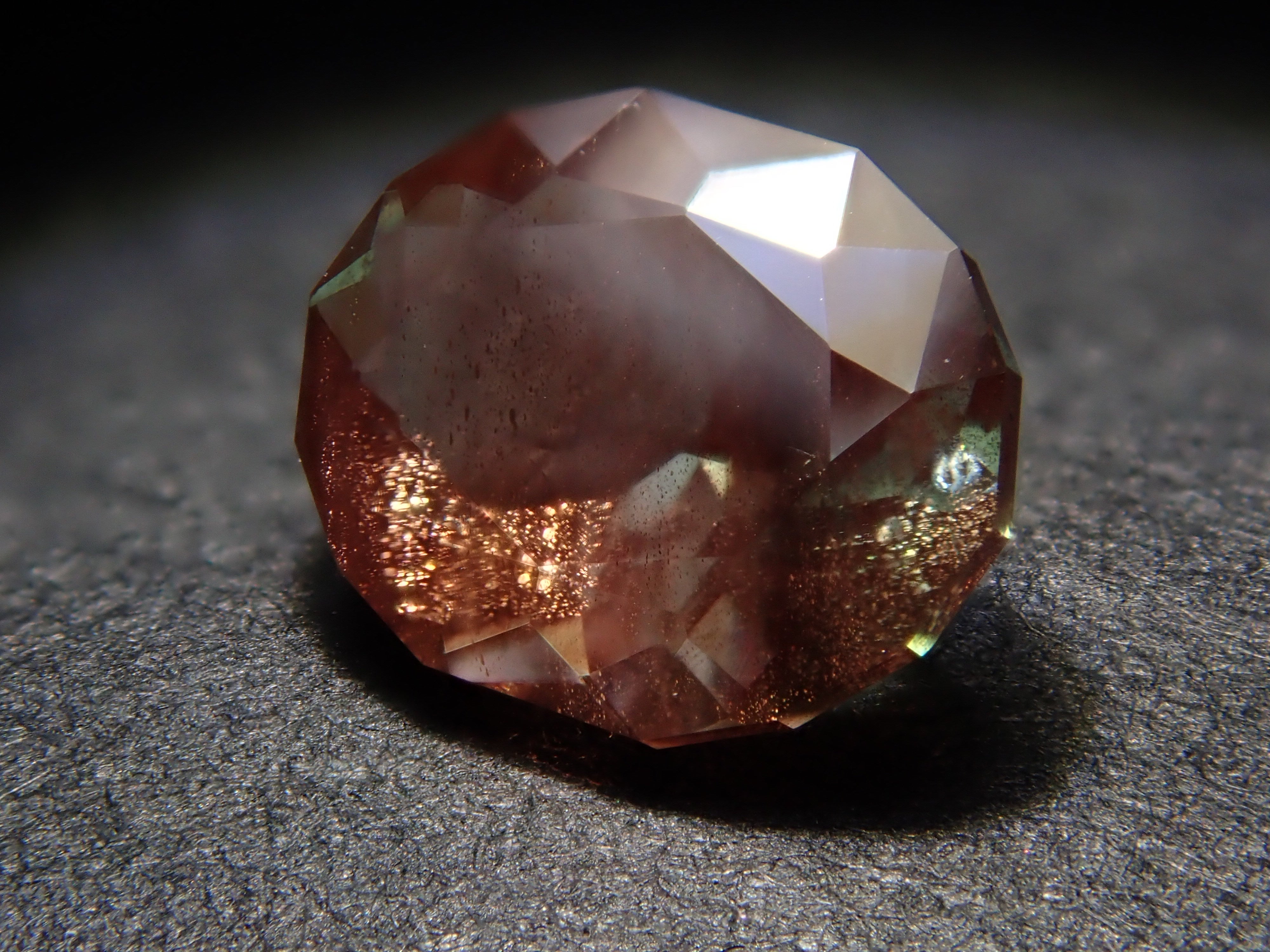 【12561305掲載】アメリカ産オレゴンサンストーン 0.472ctルース