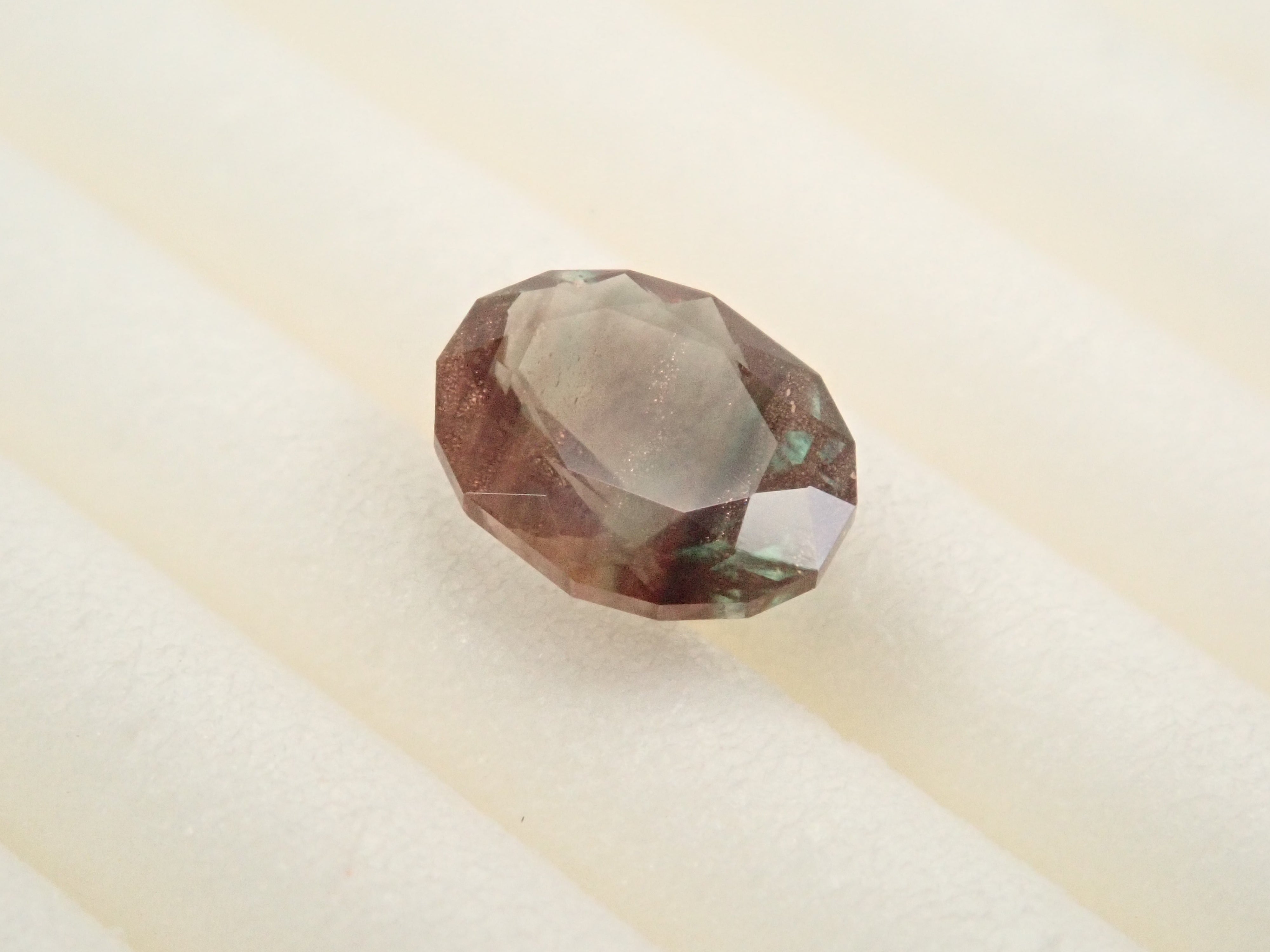 【12561305掲載】アメリカ産オレゴンサンストーン 0.472ctルース