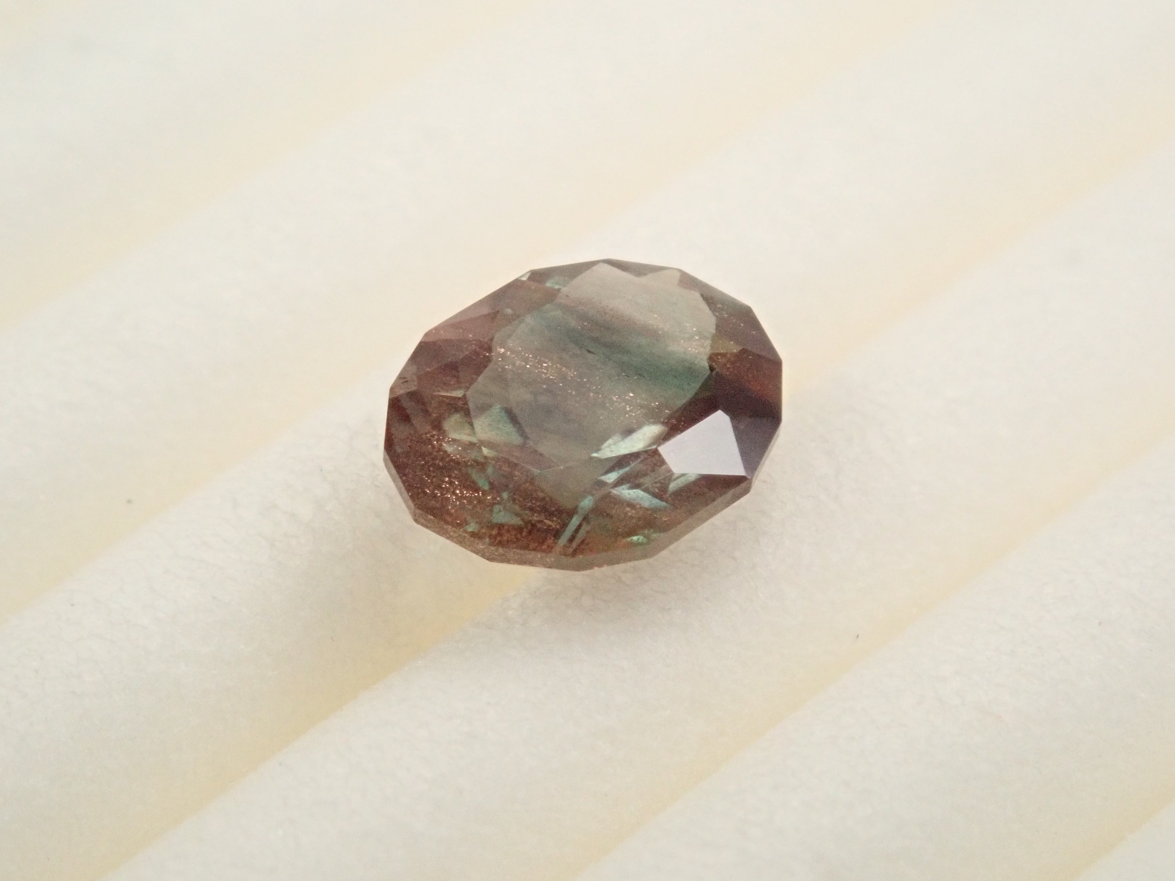 【12561305掲載】アメリカ産オレゴンサンストーン 0.472ctルース