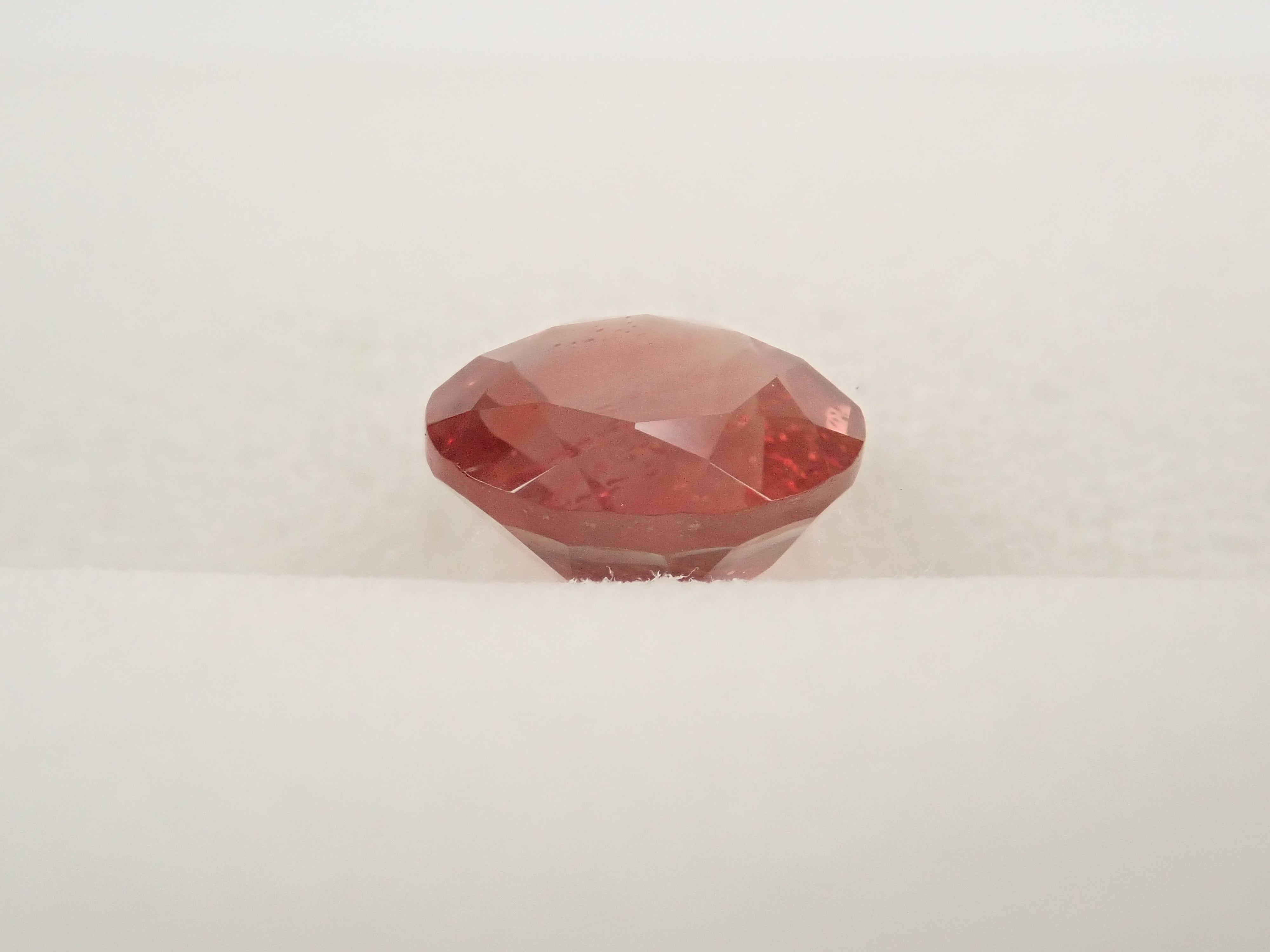 【12561984掲載】アメリカ産オレゴンサンストーン 1.308ctルース