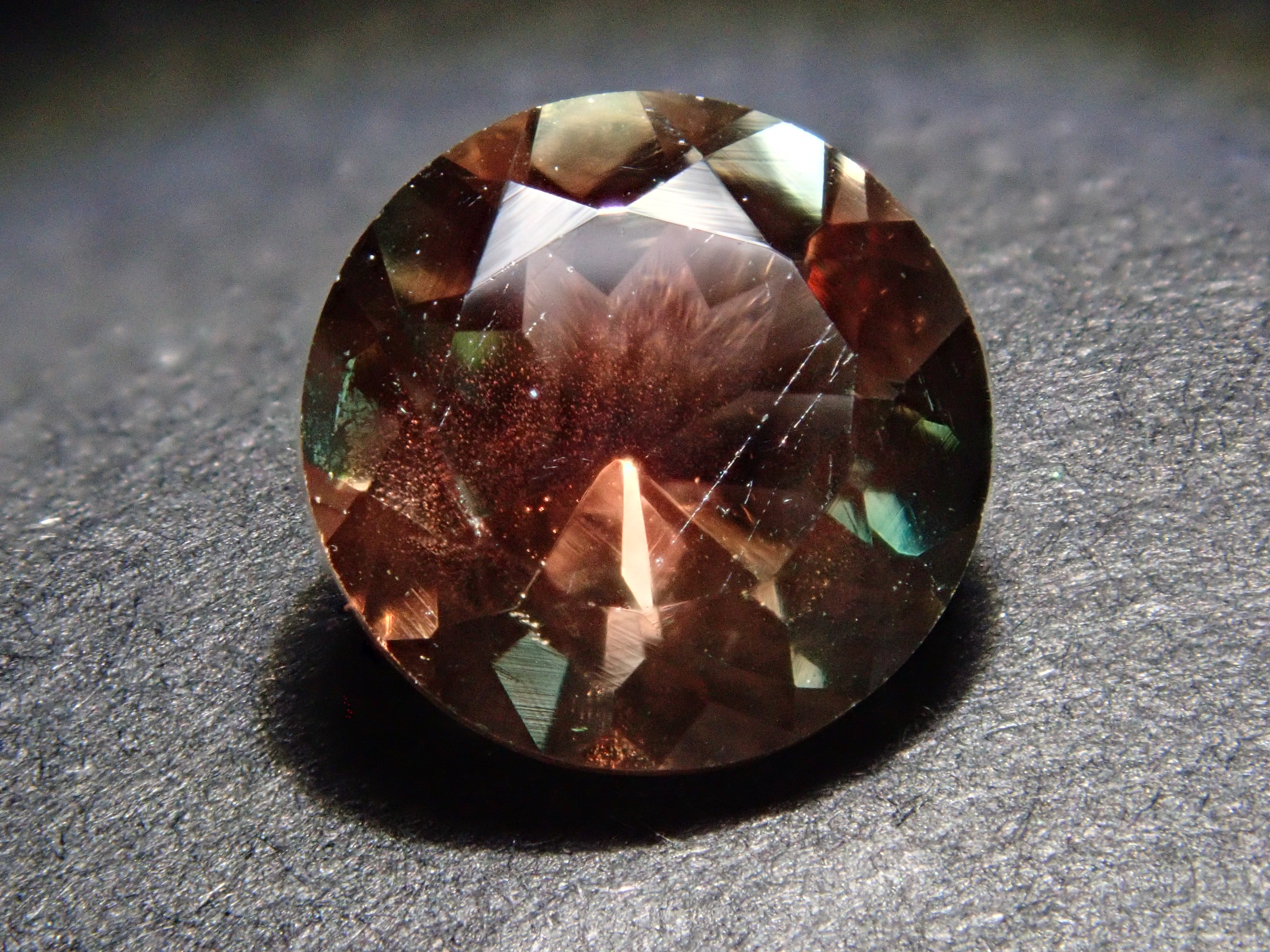 【12561989掲載】アメリカ産オレゴンサンストーン 0.793ctルース