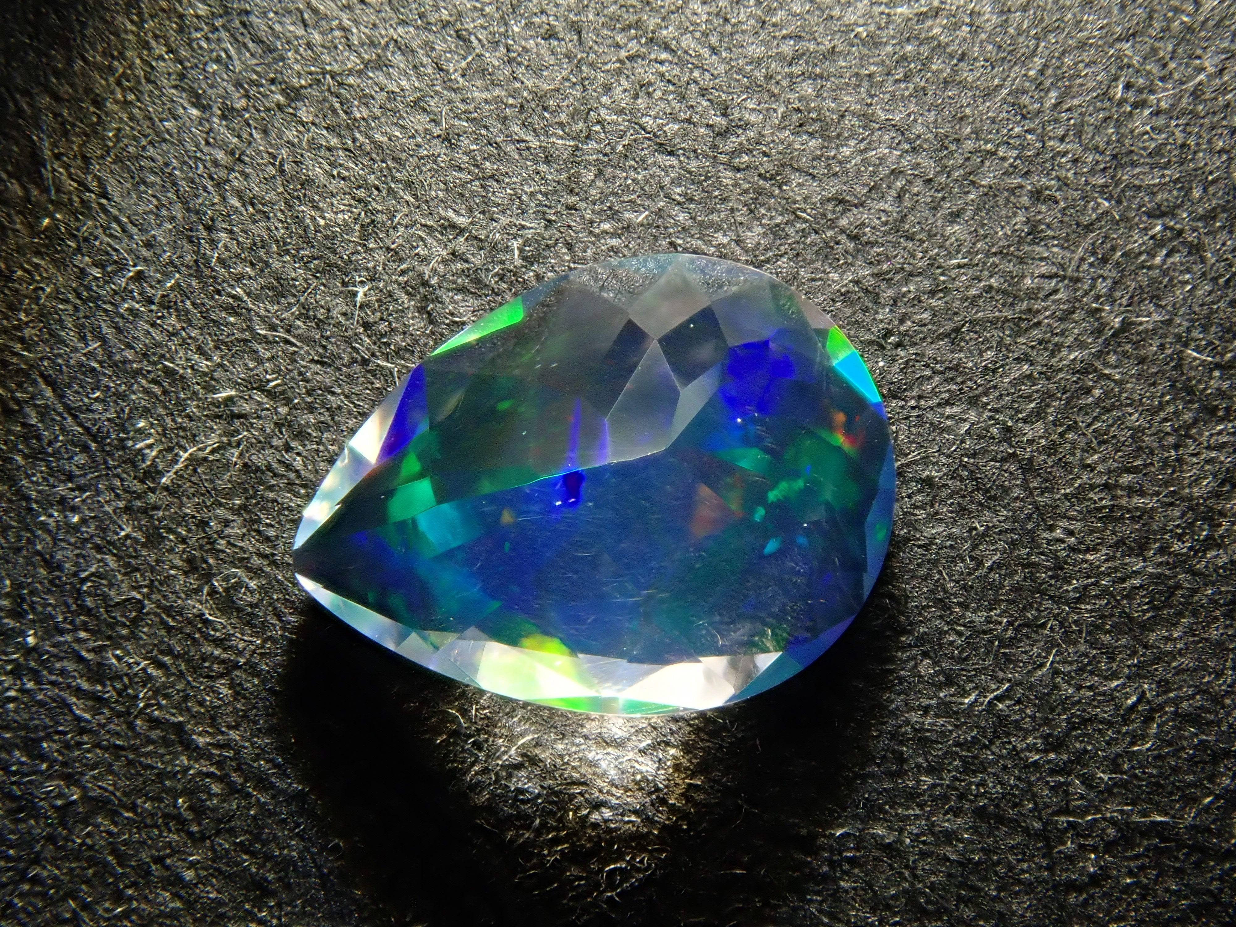 【12561168掲載】メキシコ産ウォーターオパール(ファセットカット) 0.349ctルース