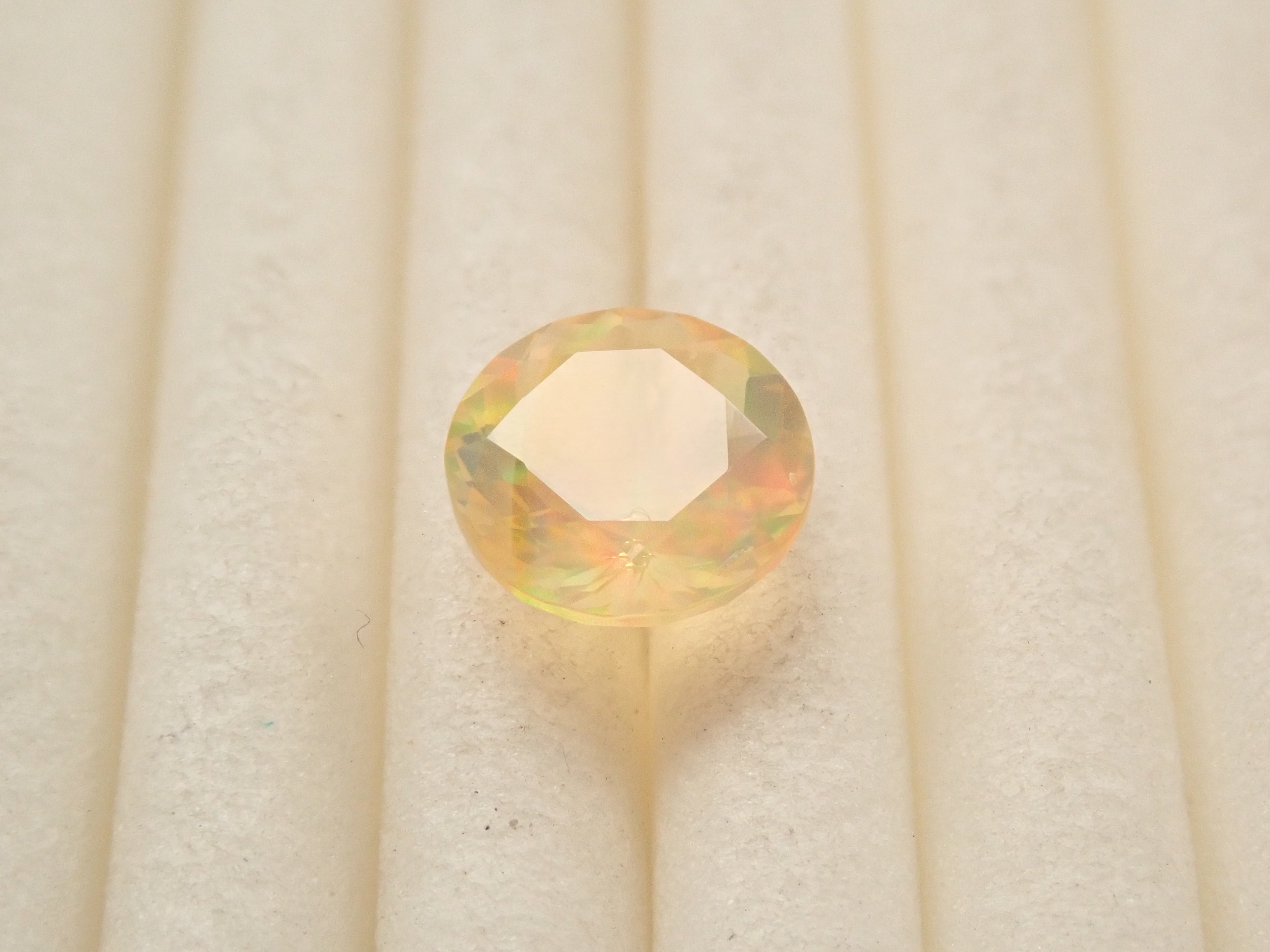 【12561174掲載】メキシコ産ファイアオパール(ファセットカット) 0.517ctルース