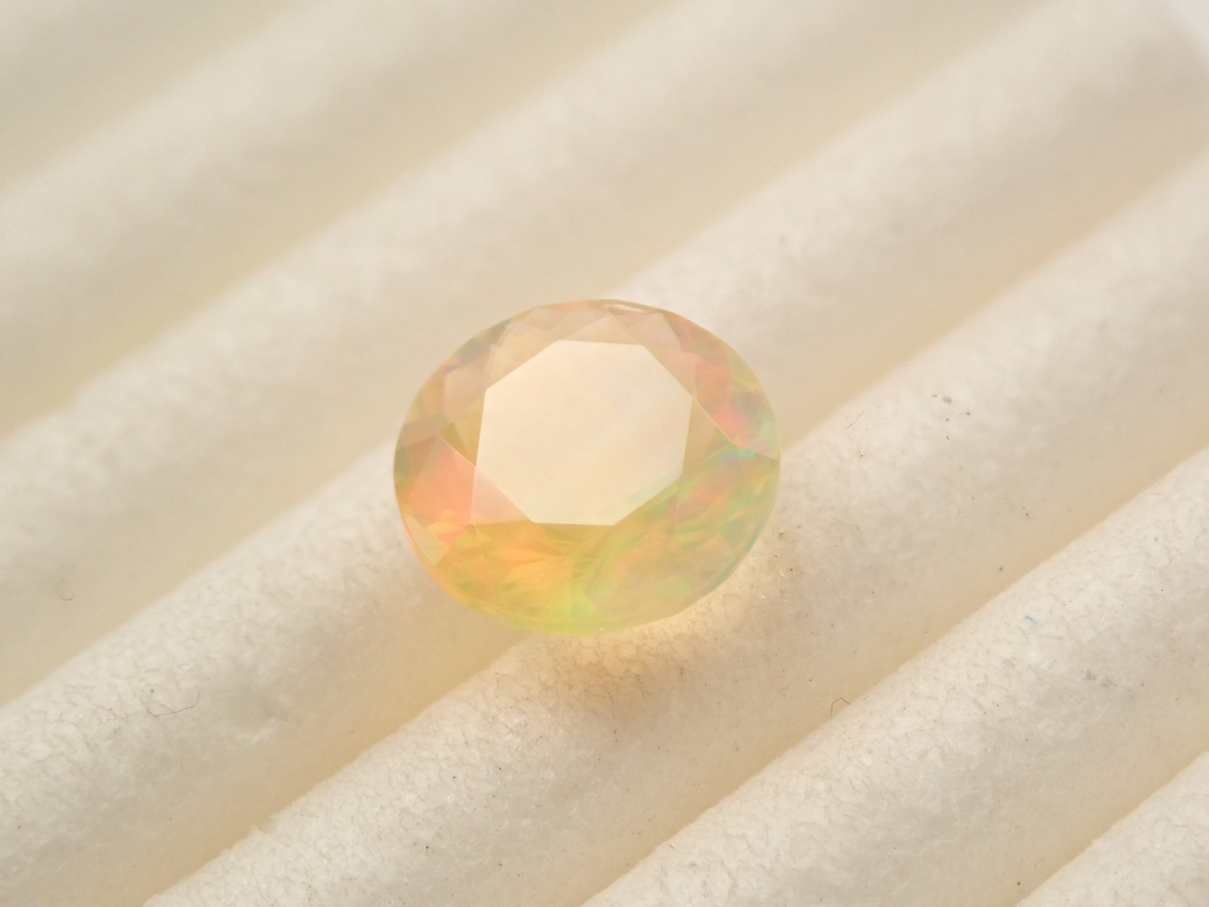 【12561174掲載】メキシコ産ファイアオパール(ファセットカット) 0.517ctルース