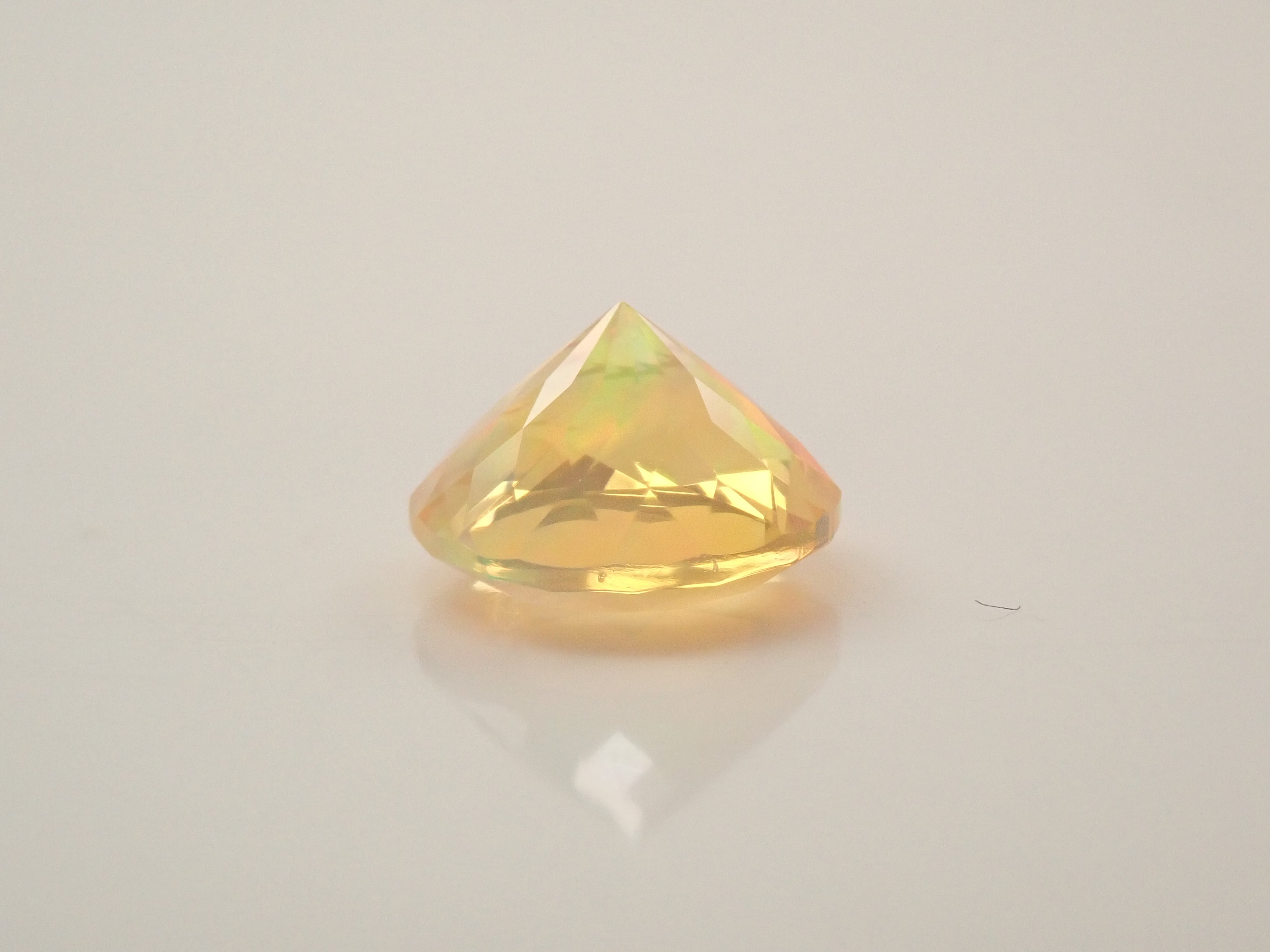 【12561174掲載】メキシコ産ファイアオパール(ファセットカット) 0.517ctルース