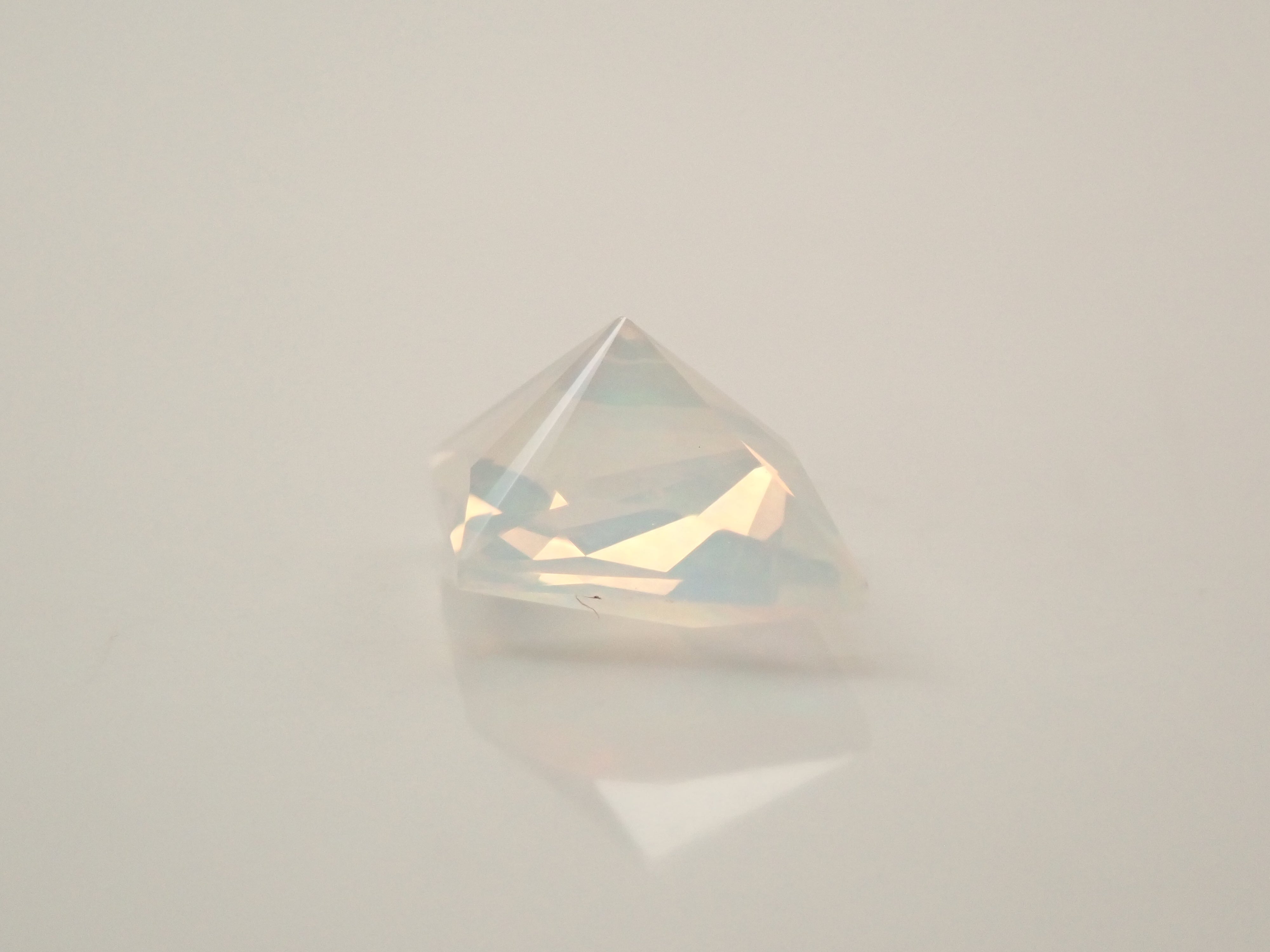 【12561176掲載】メキシコ産オパール(ファセットカット) 0.644ctルース