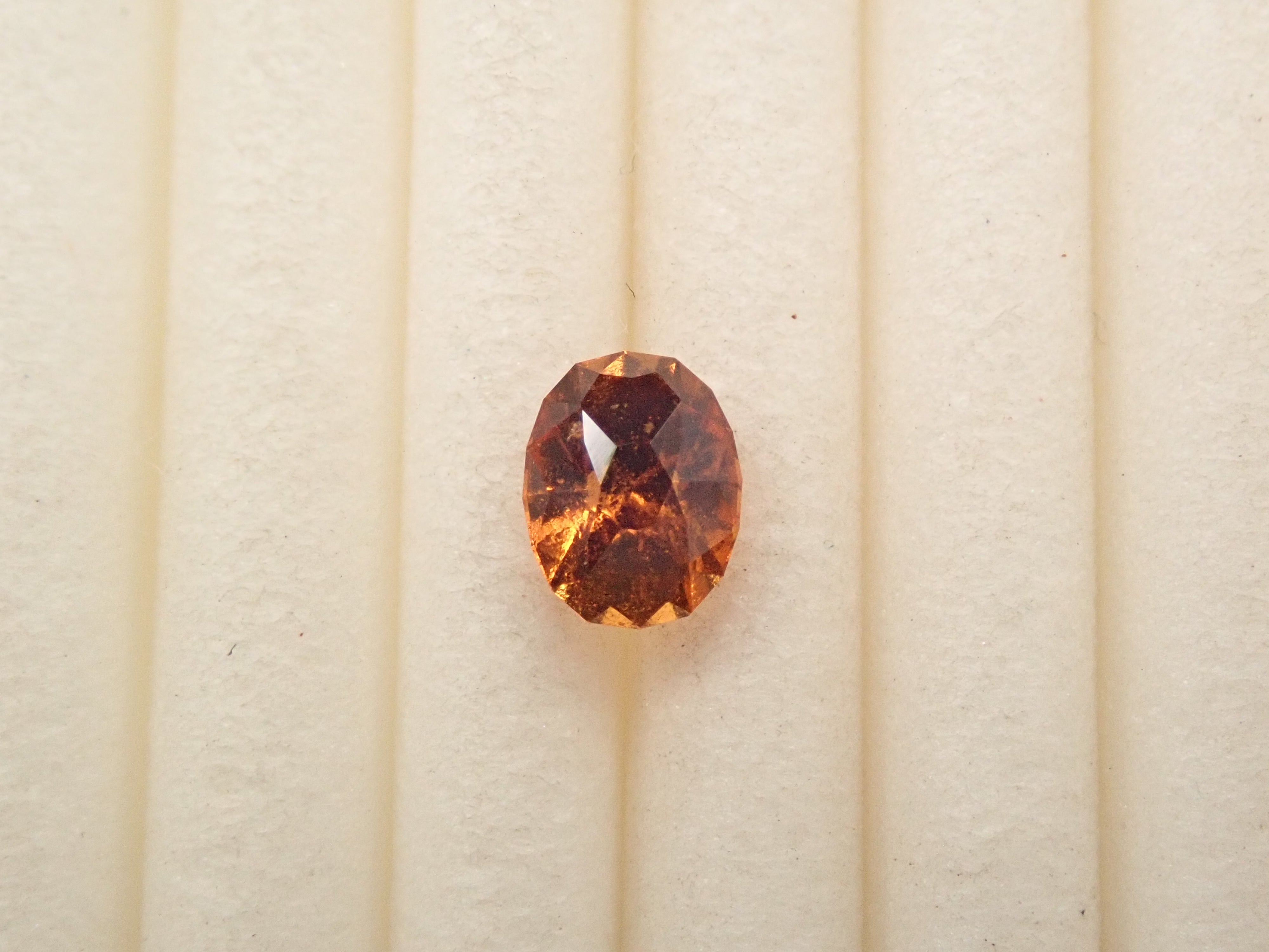 【12561612掲載】スリランカ産ヘソナイトガーネット 0.441ctルース