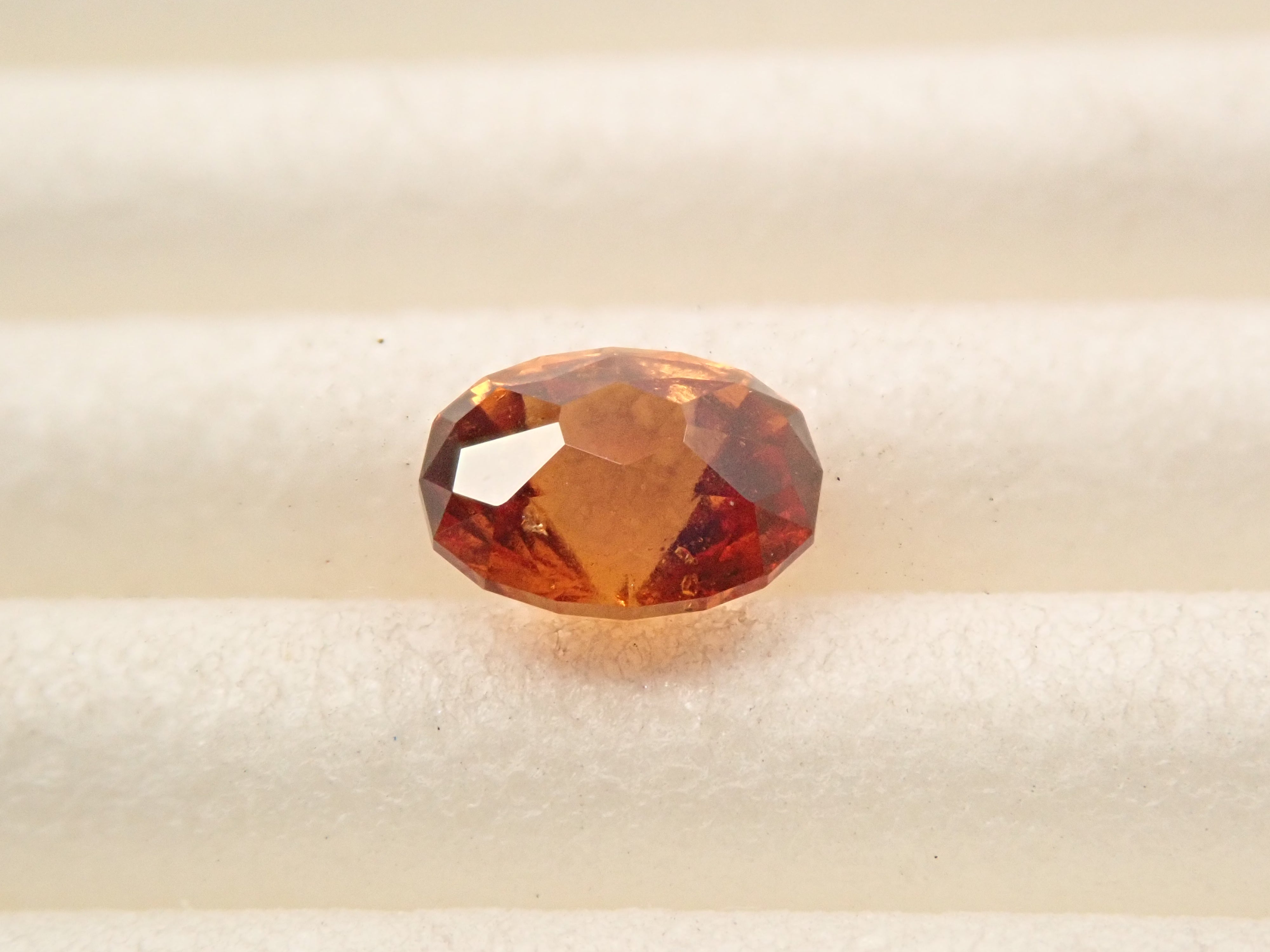 【12561612掲載】スリランカ産ヘソナイトガーネット 0.441ctルース