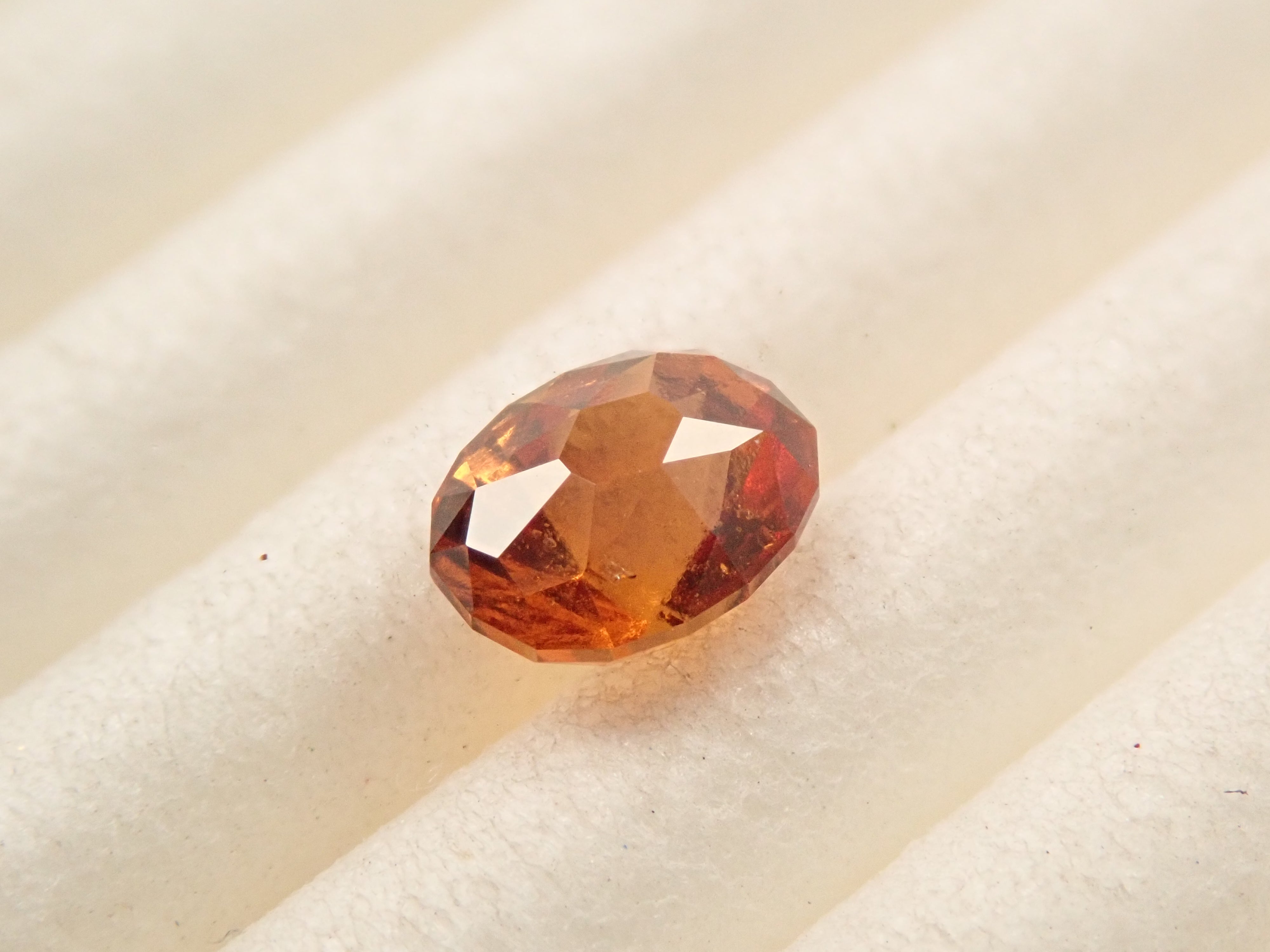 【12561612掲載】スリランカ産ヘソナイトガーネット 0.441ctルース