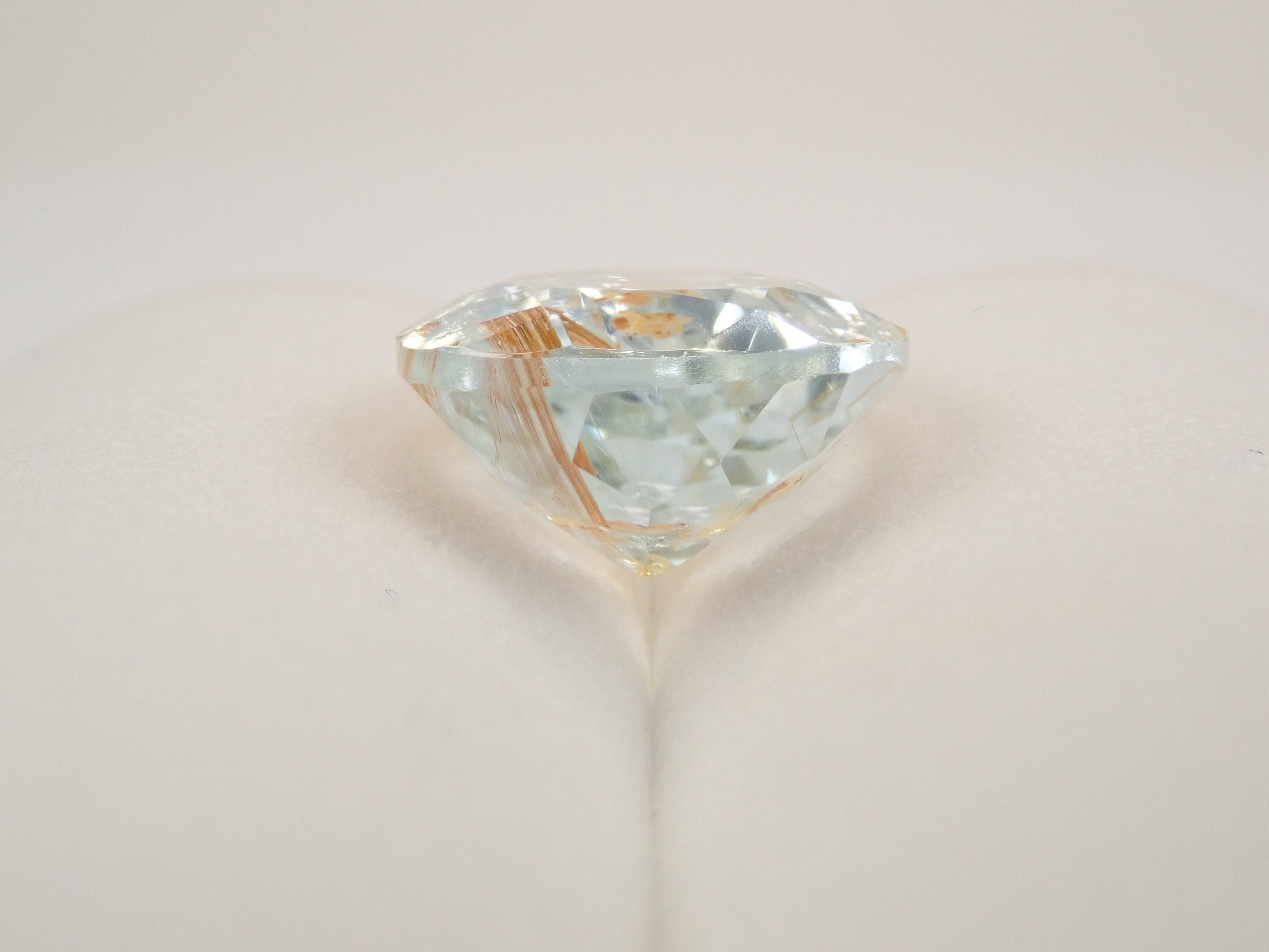 【12562024掲載】ブラジル産ライモナイトインブルートパーズ 9.314ctルース