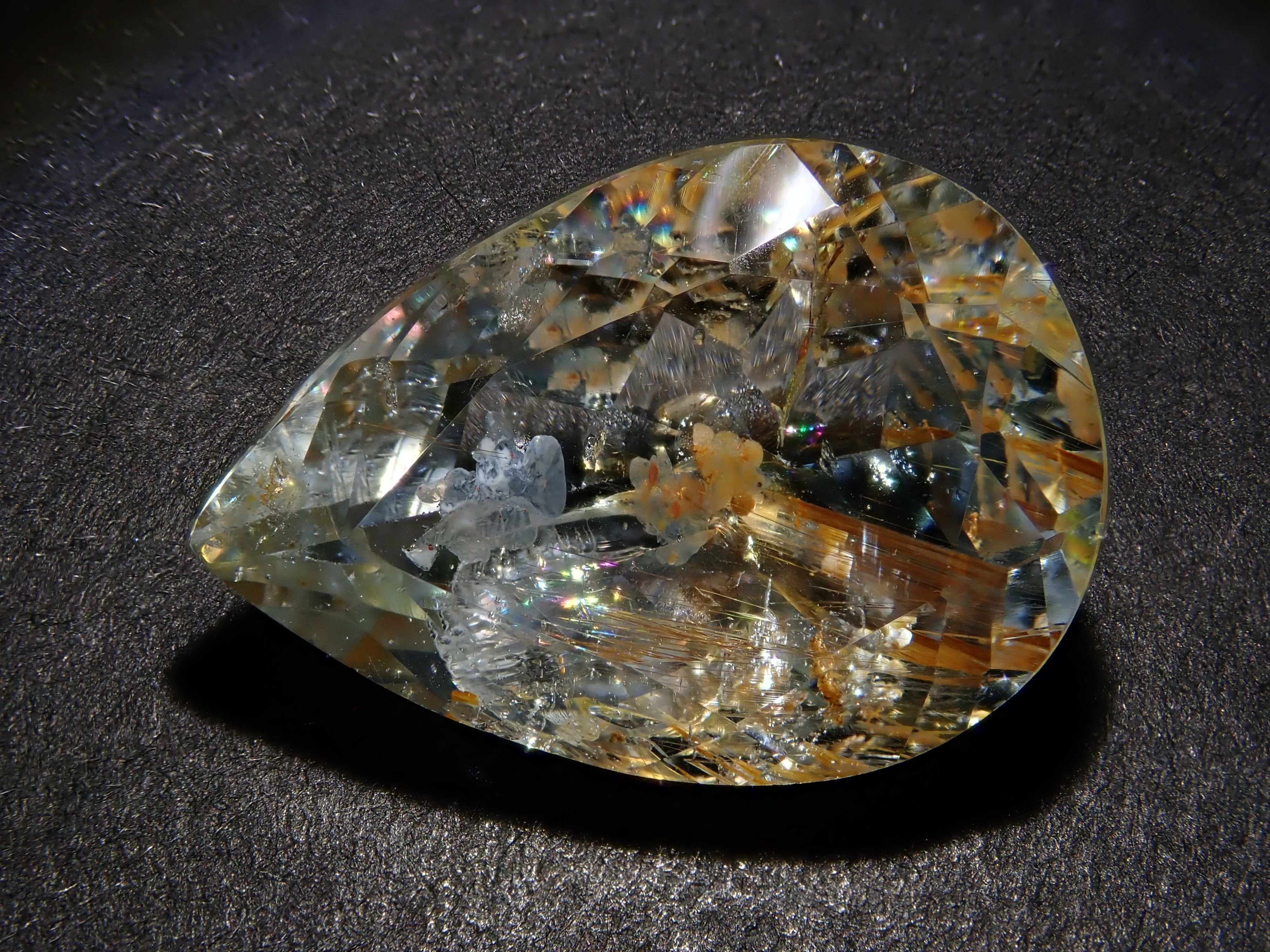 【12562024掲載】ブラジル産ライモナイトインブルートパーズ 9.314ctルース