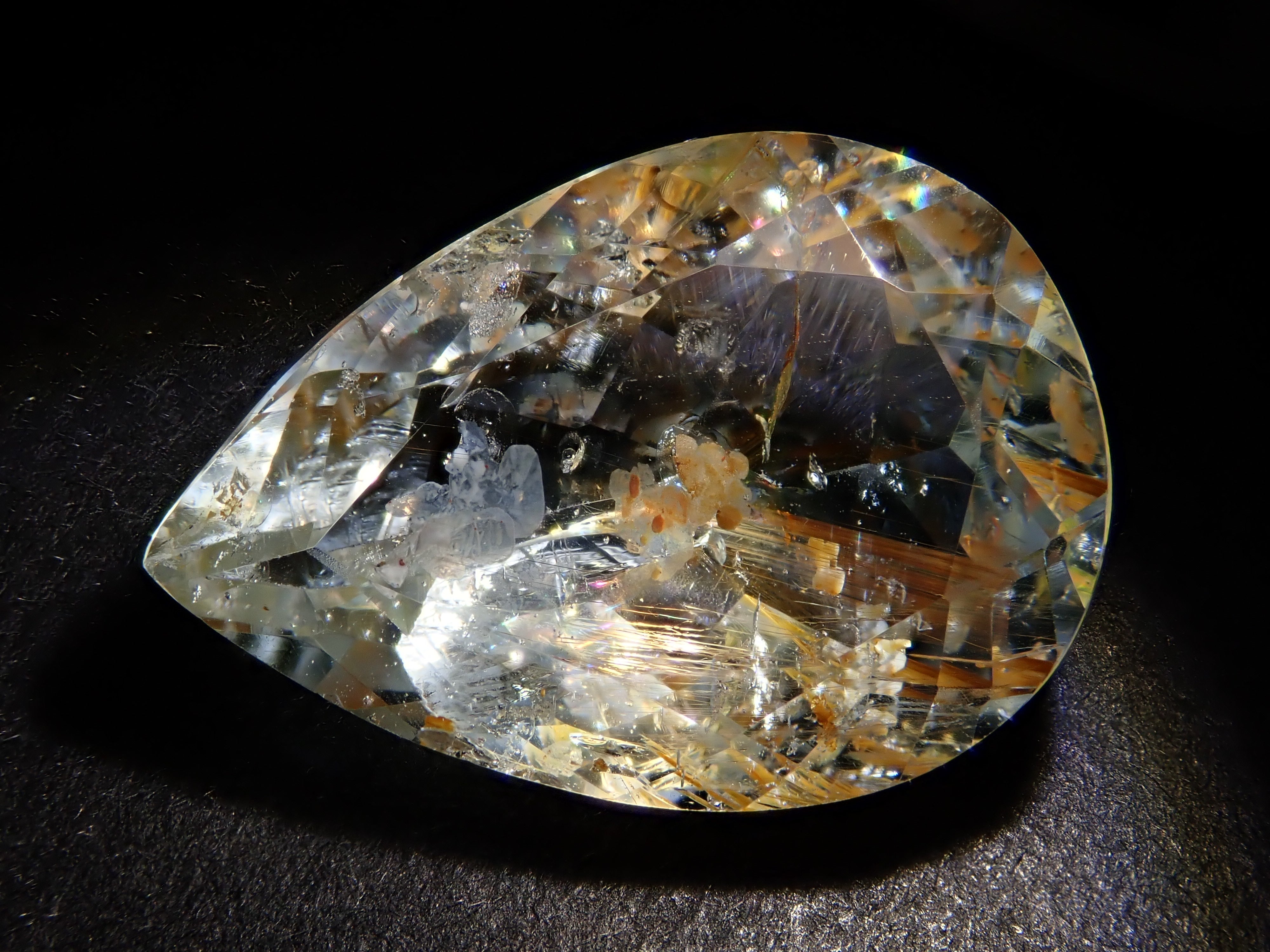 【12562024掲載】ブラジル産ライモナイトインブルートパーズ 9.314ctルース