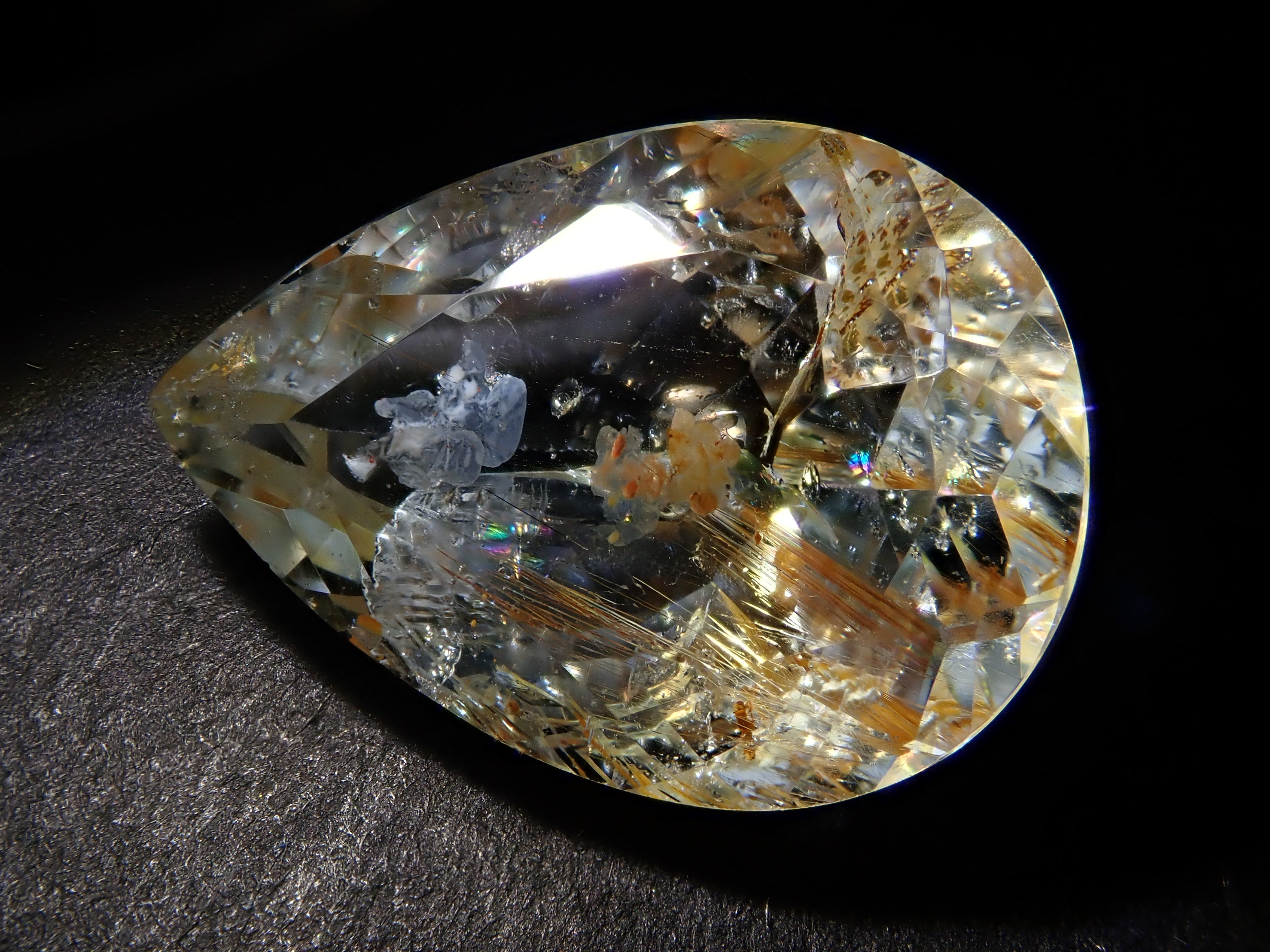 【12562024掲載】ブラジル産ライモナイトインブルートパーズ 9.314ctルース