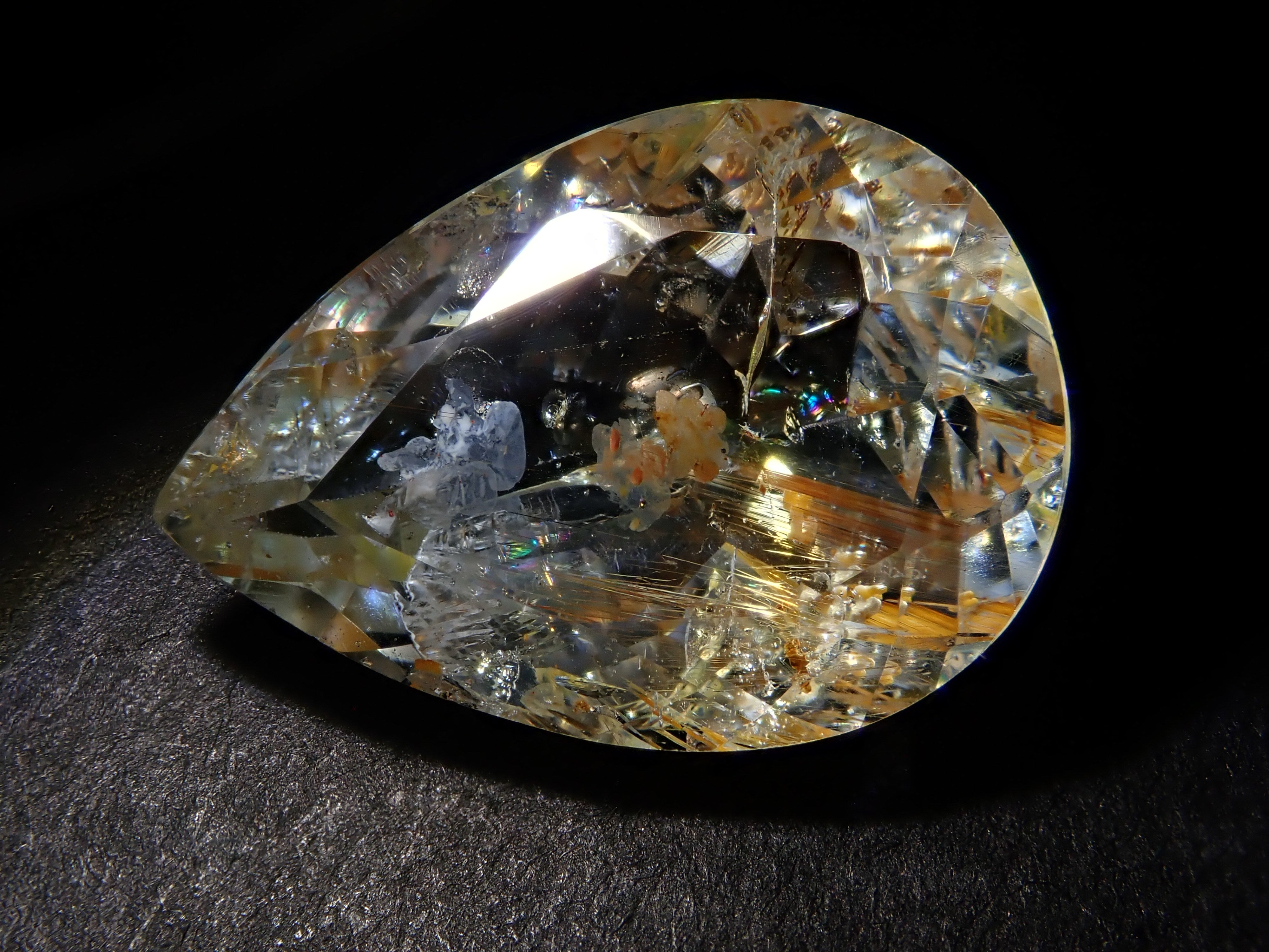 【12562024掲載】ブラジル産ライモナイトインブルートパーズ 9.314ctルース