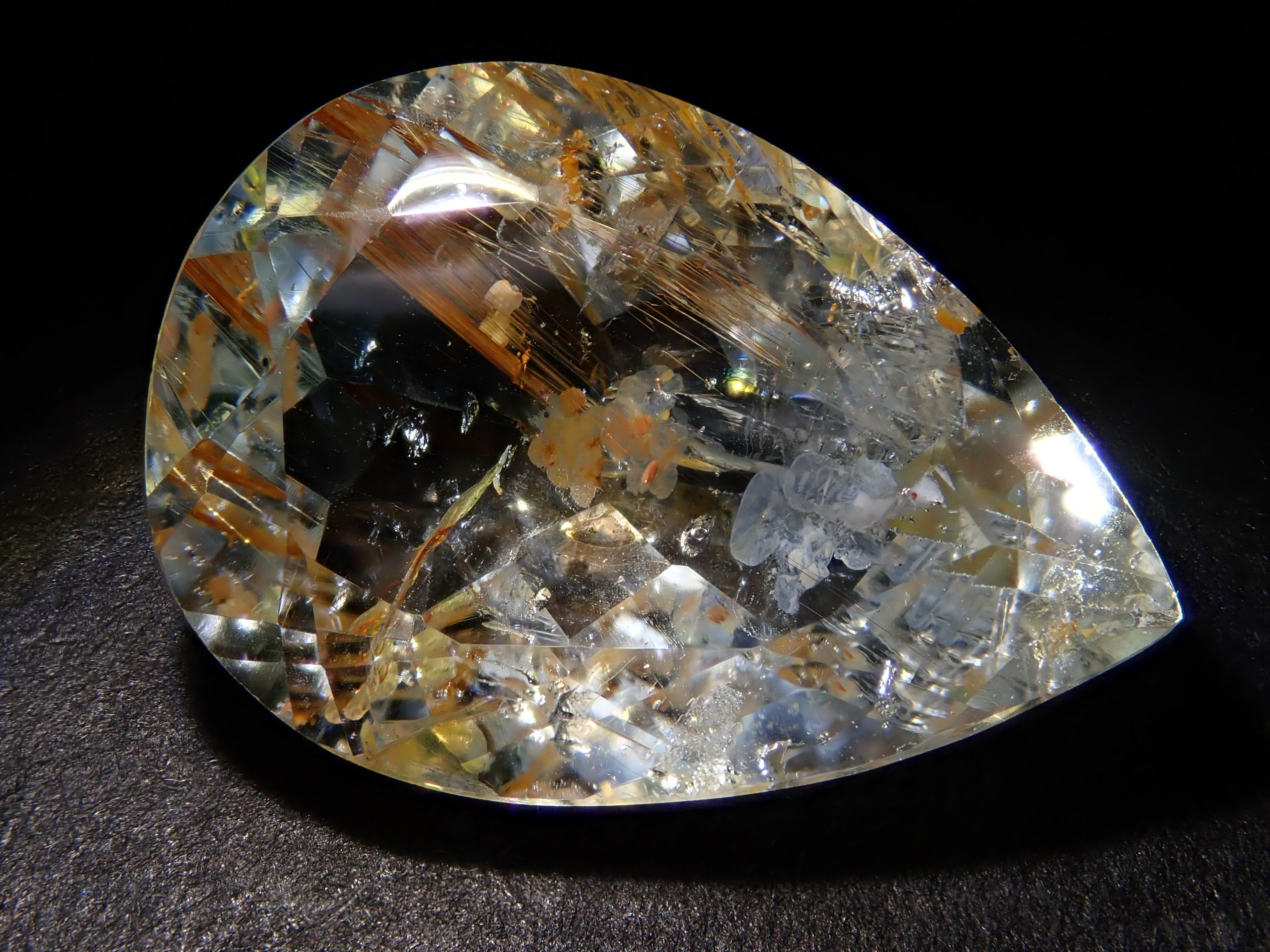 【12562024掲載】ブラジル産ライモナイトインブルートパーズ 9.314ctルース