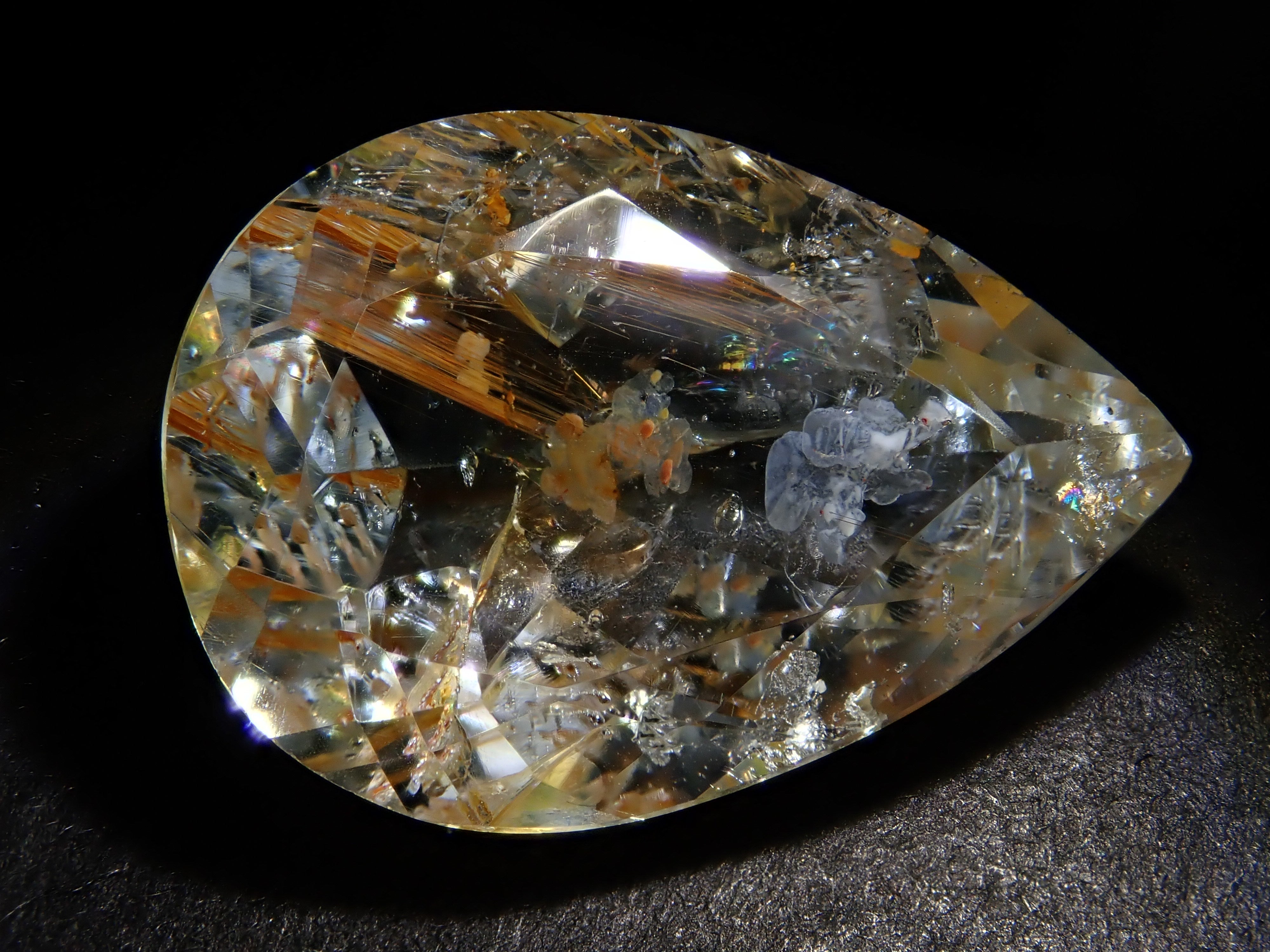 【12562024掲載】ブラジル産ライモナイトインブルートパーズ 9.314ctルース