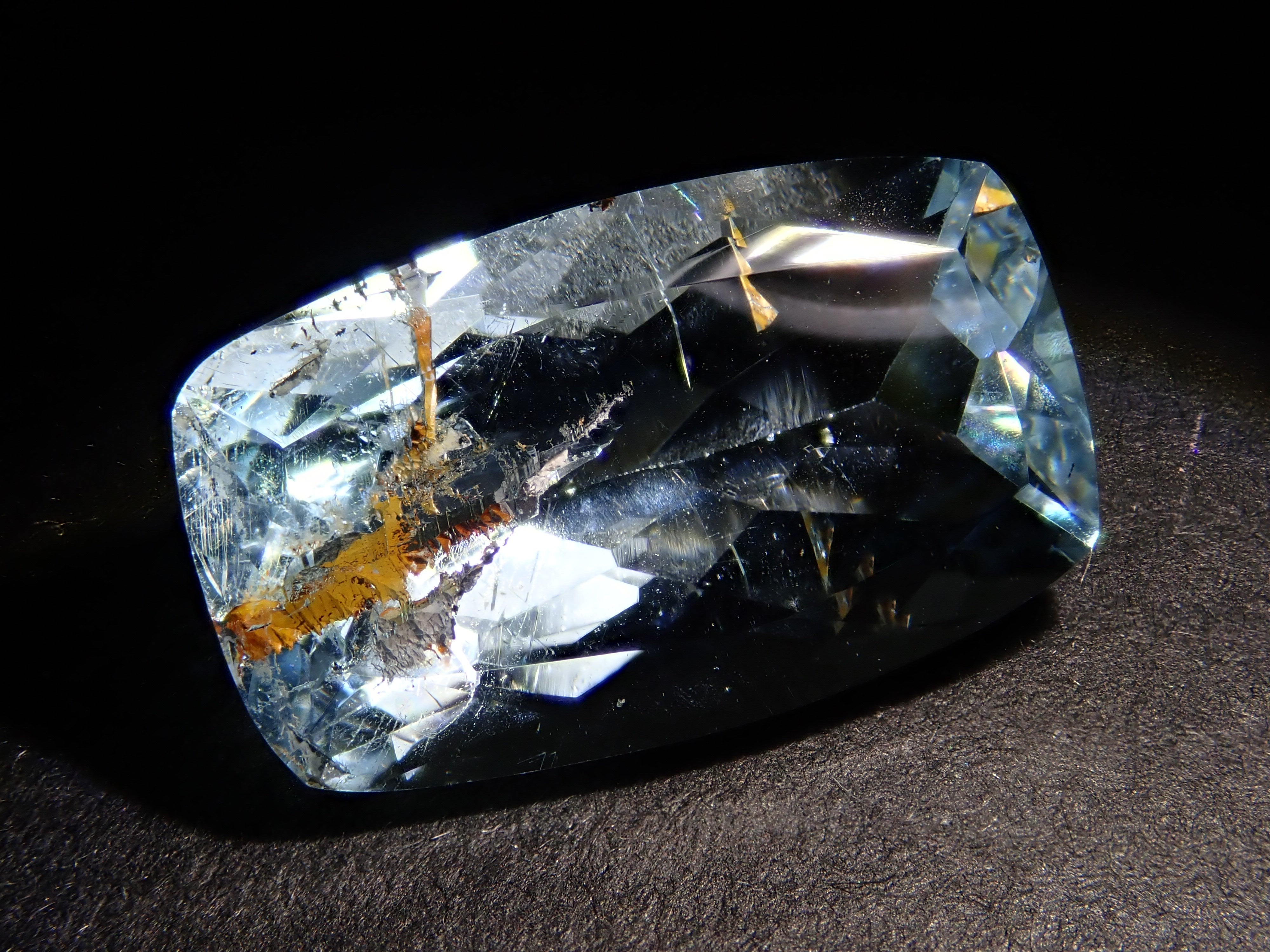 【12562025掲載】ブラジル産ライモナイトインブルートパーズ 6.701ctルース