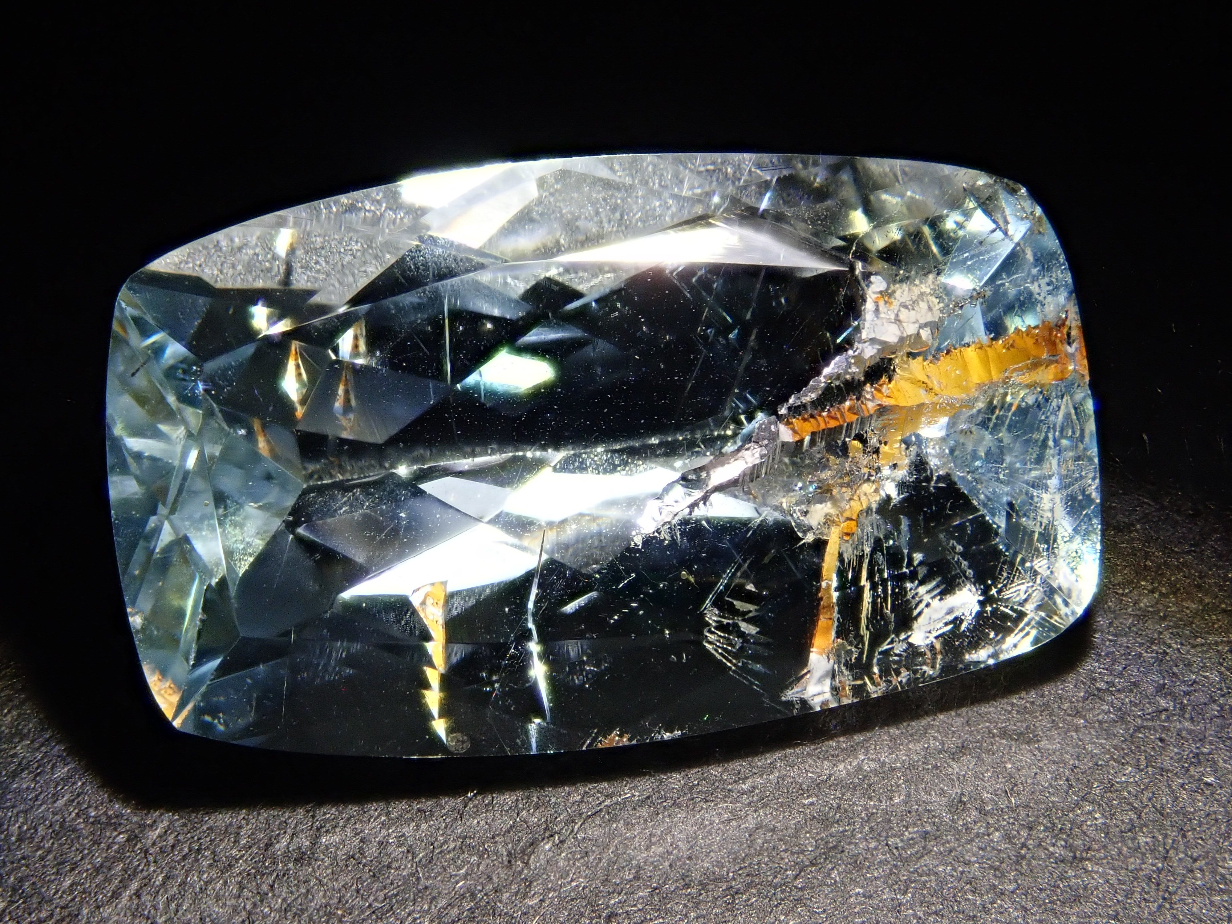 【12562025掲載】ブラジル産ライモナイトインブルートパーズ 6.701ctルース