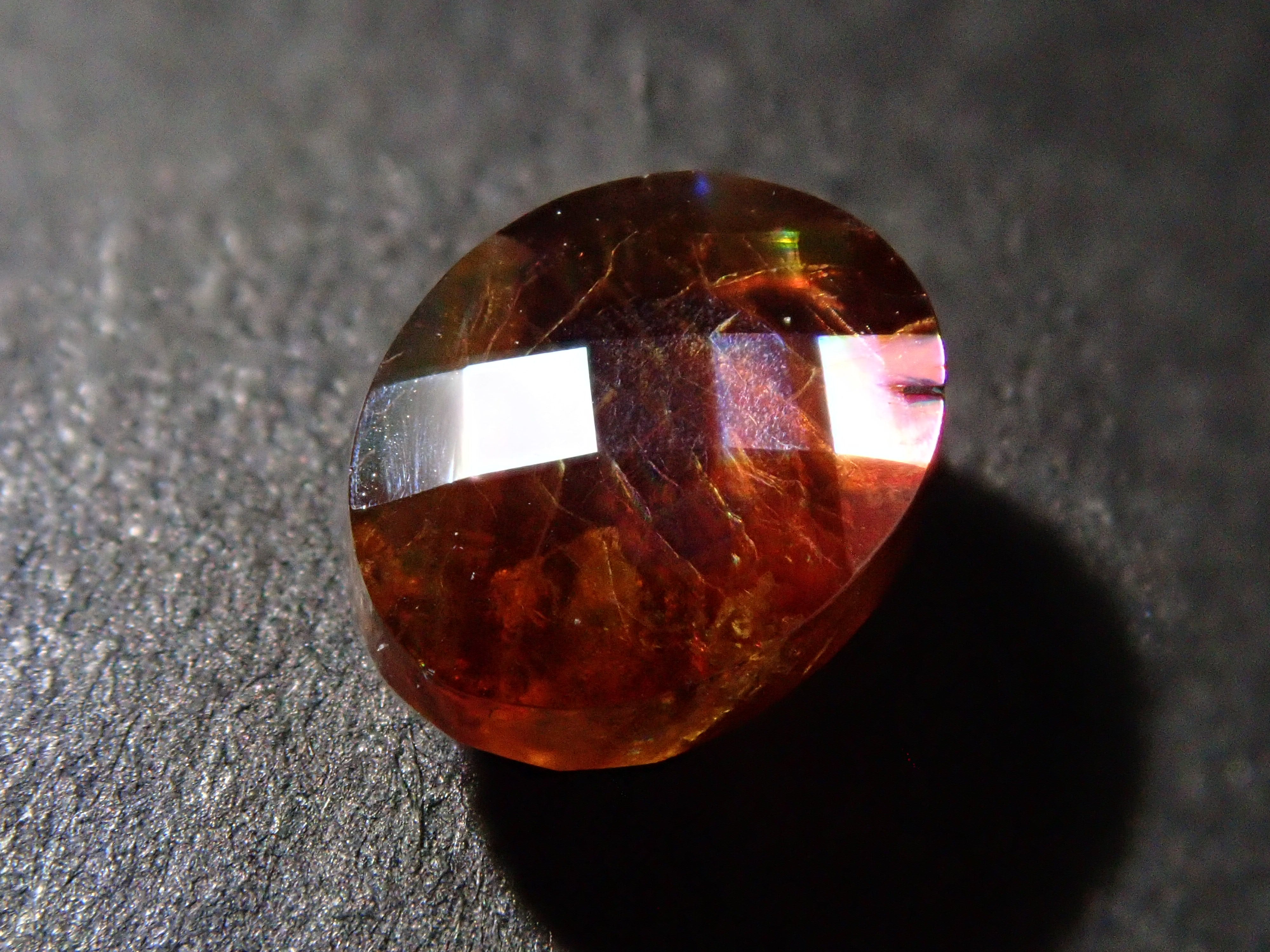 【12562003掲載】奈良県天川村産レインボーガーネット(アンドラダイトガーネット) 1.207ctルース