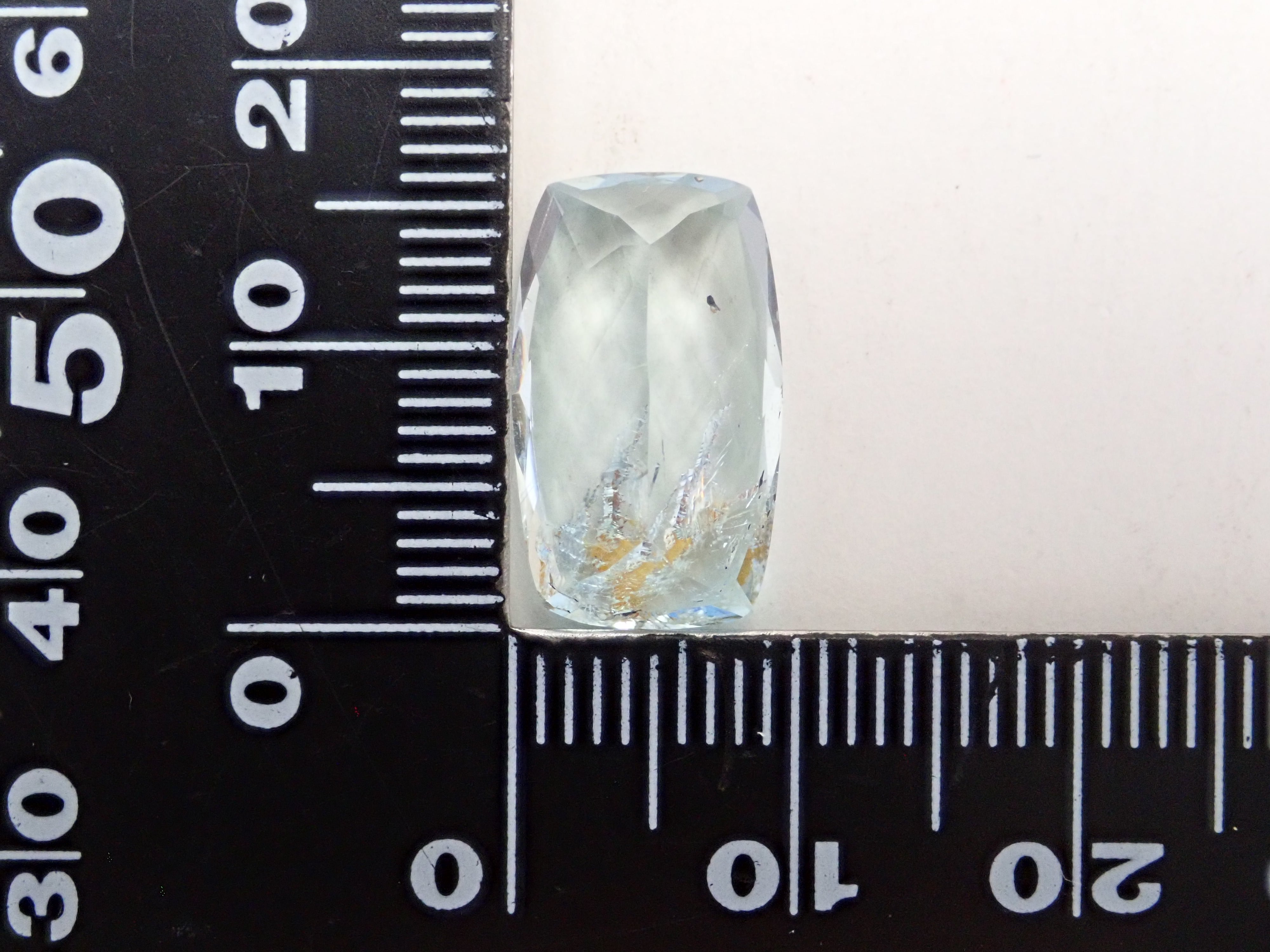 【12562025掲載】ブラジル産ライモナイトインブルートパーズ 6.701ctルース