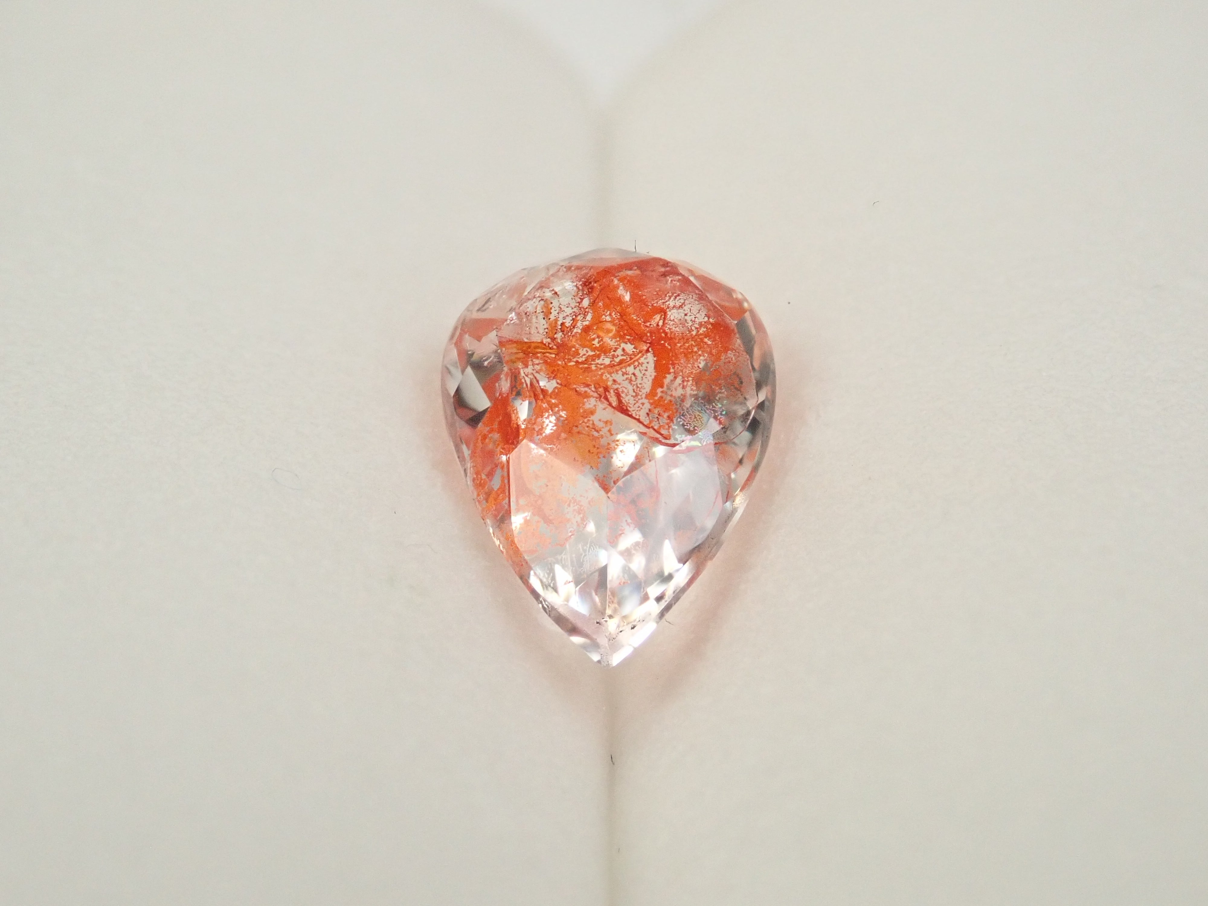 【12562074掲載】ブラジル産ライモナイトインクォーツ(オーロラクォーツ) 1.894ctルース