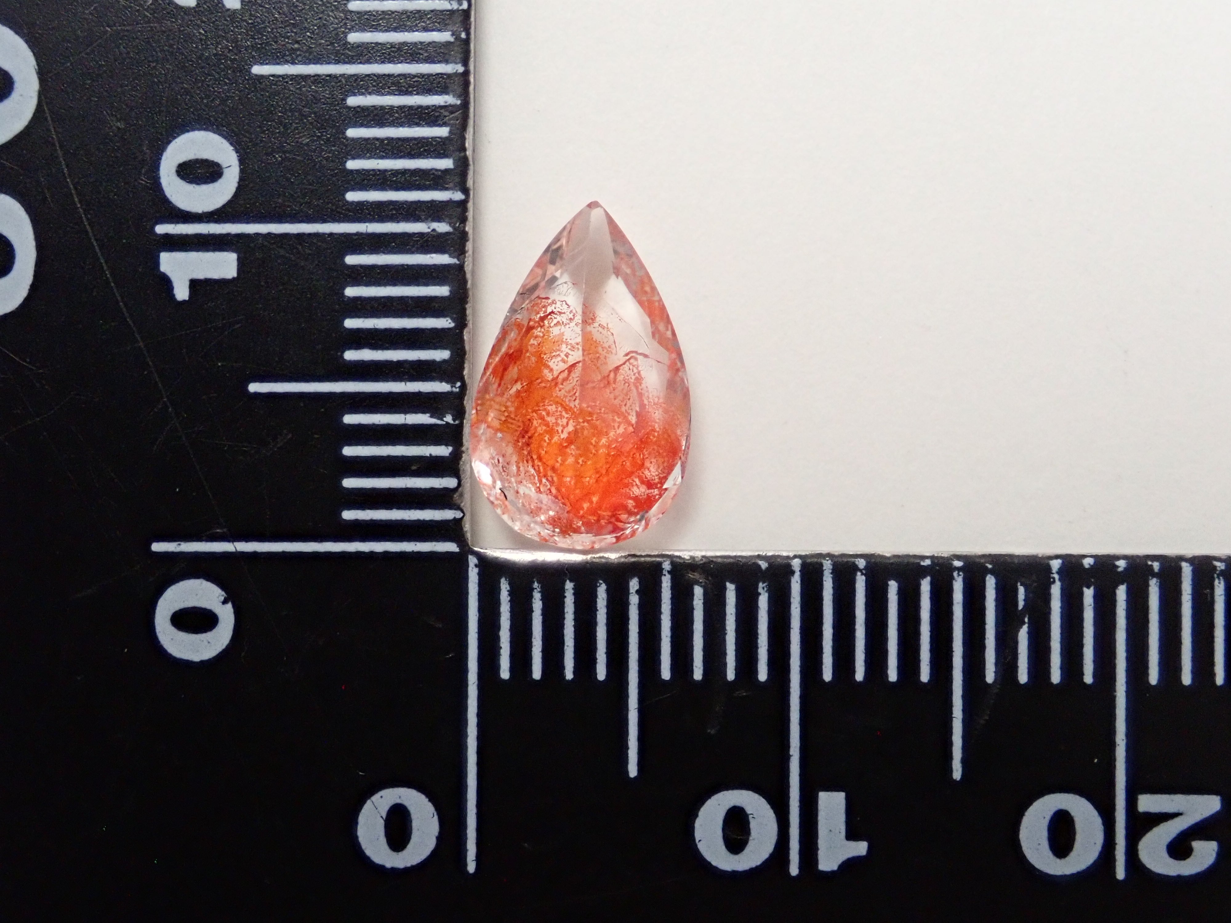 【12562074掲載】ブラジル産ライモナイトインクォーツ(オーロラクォーツ) 1.894ctルース