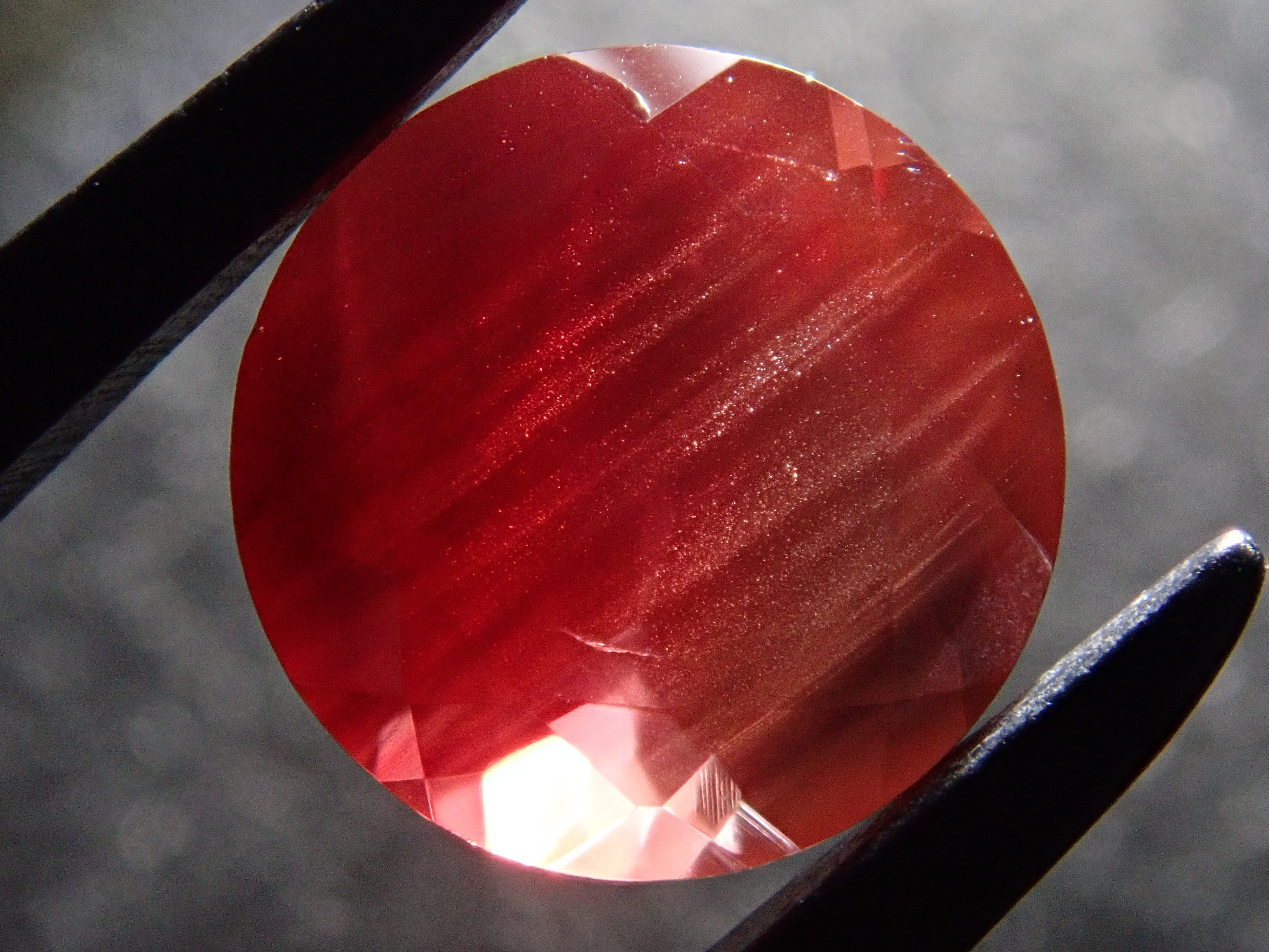 【12562076掲載】アメリカ産オレゴンサンストーン 1.334ctルース