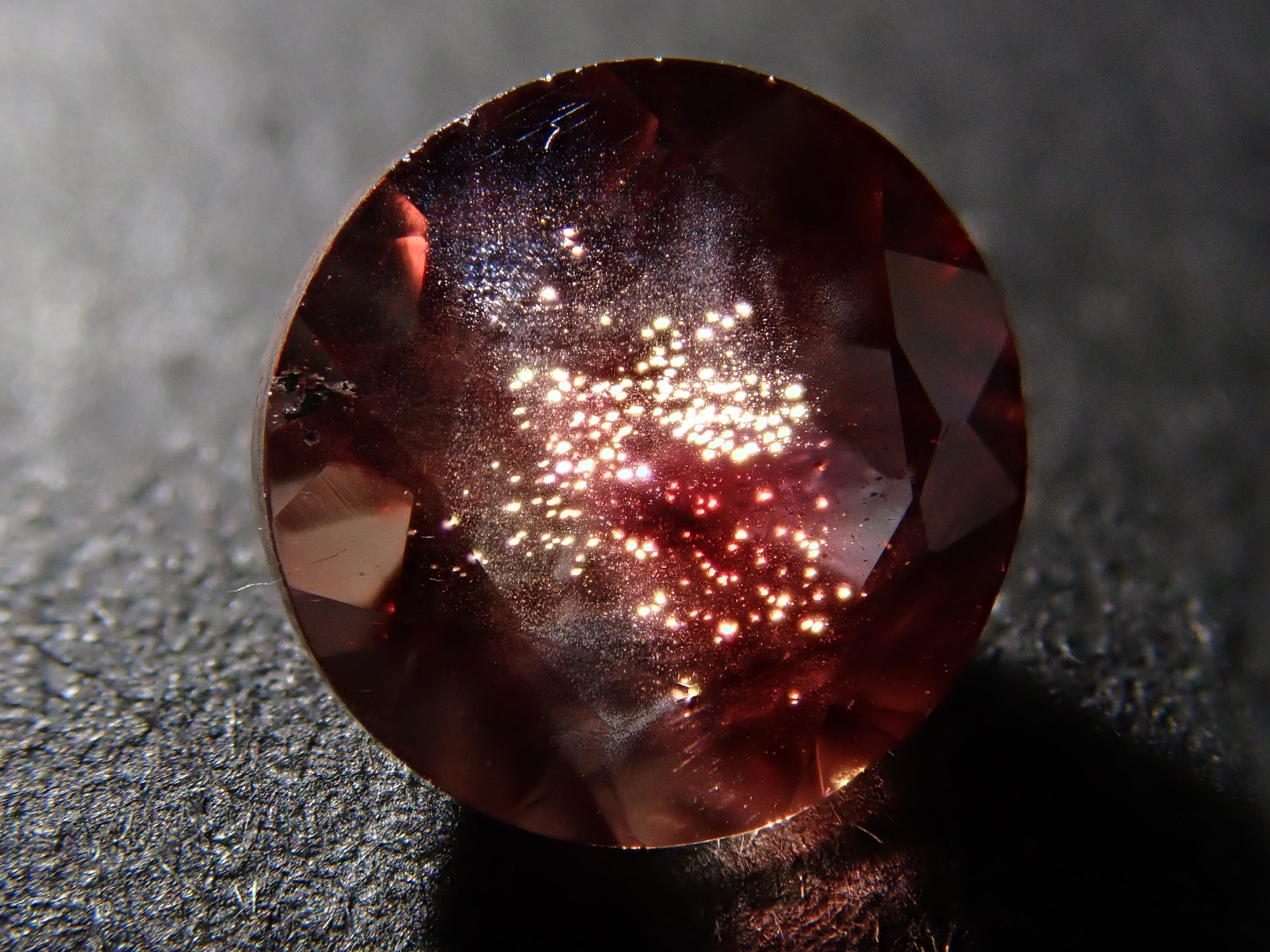 【12562078掲載】アメリカ産オレゴンサンストーン 0.820ctルース