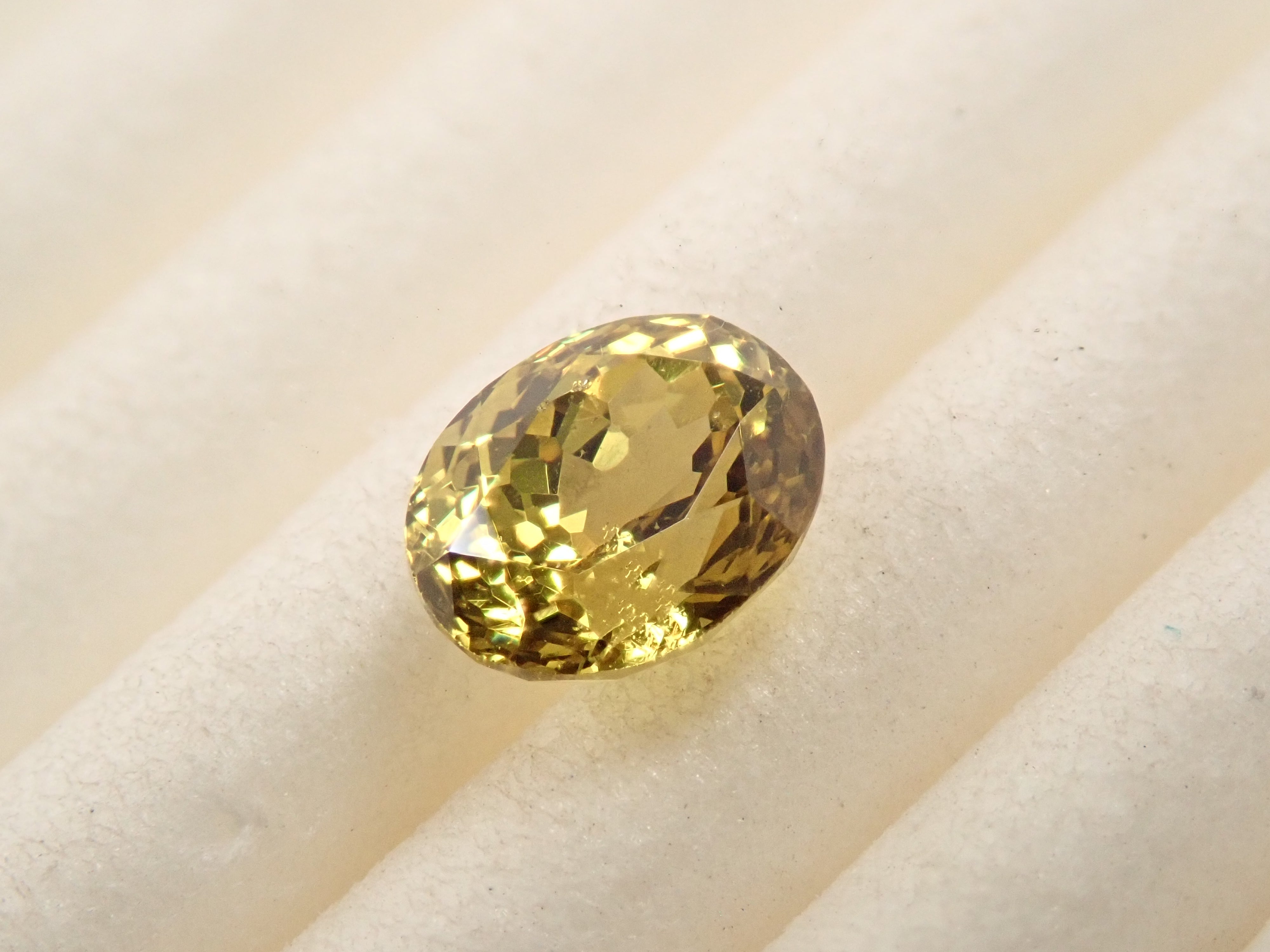 【12559534掲載】マリガーネット(グロッシュラー/アンドラダイト・ガーネット) 0.675ctルース