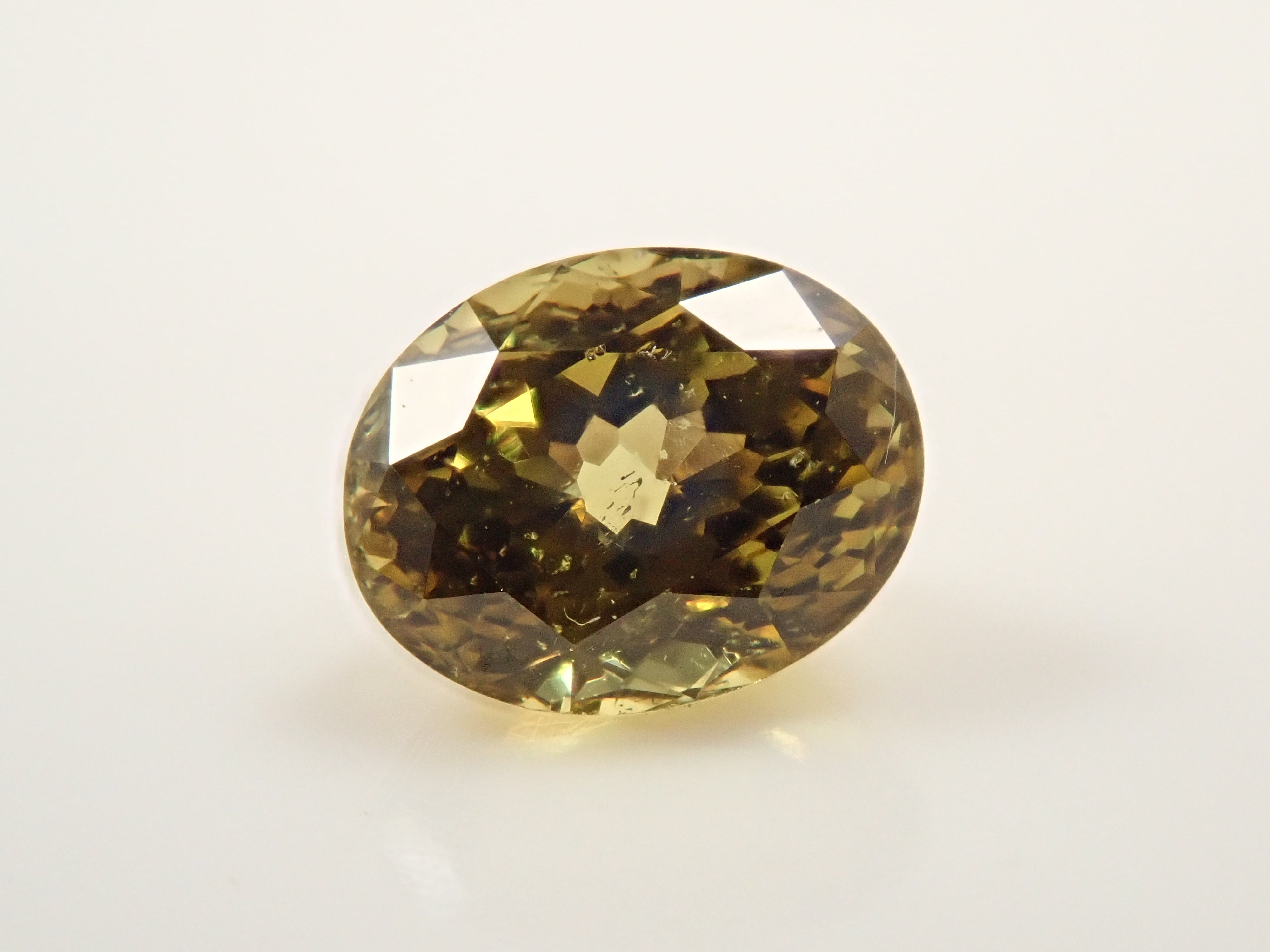 【12559534掲載】マリガーネット(グロッシュラー/アンドラダイト・ガーネット) 0.675ctルース