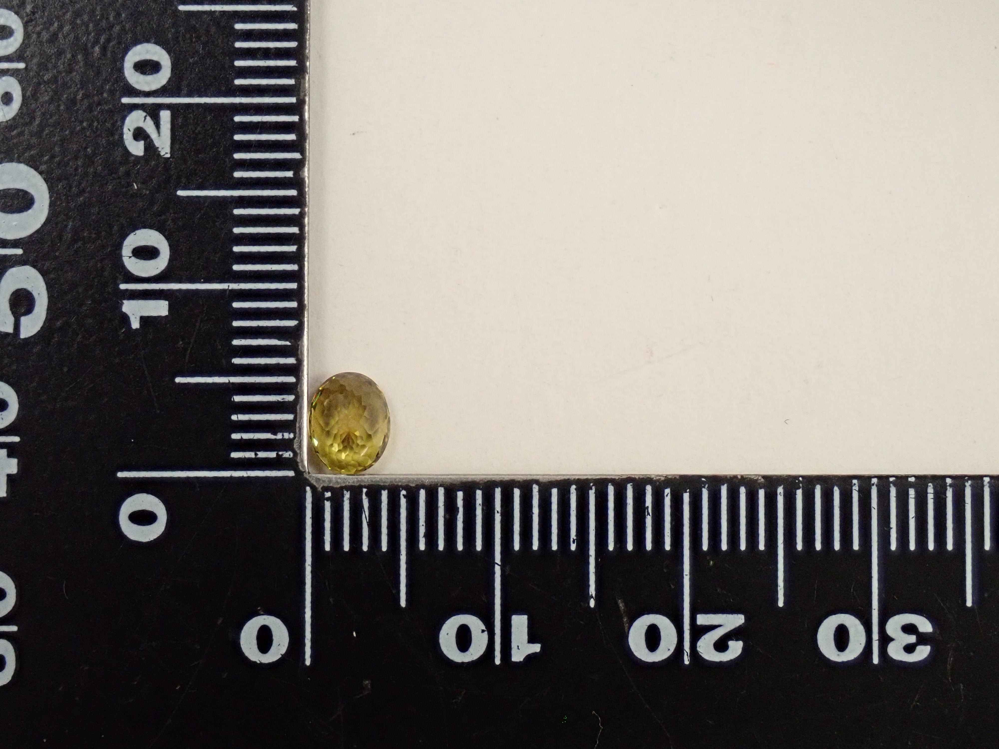 【12559534掲載】マリガーネット(グロッシュラー/アンドラダイト・ガーネット) 0.675ctルース