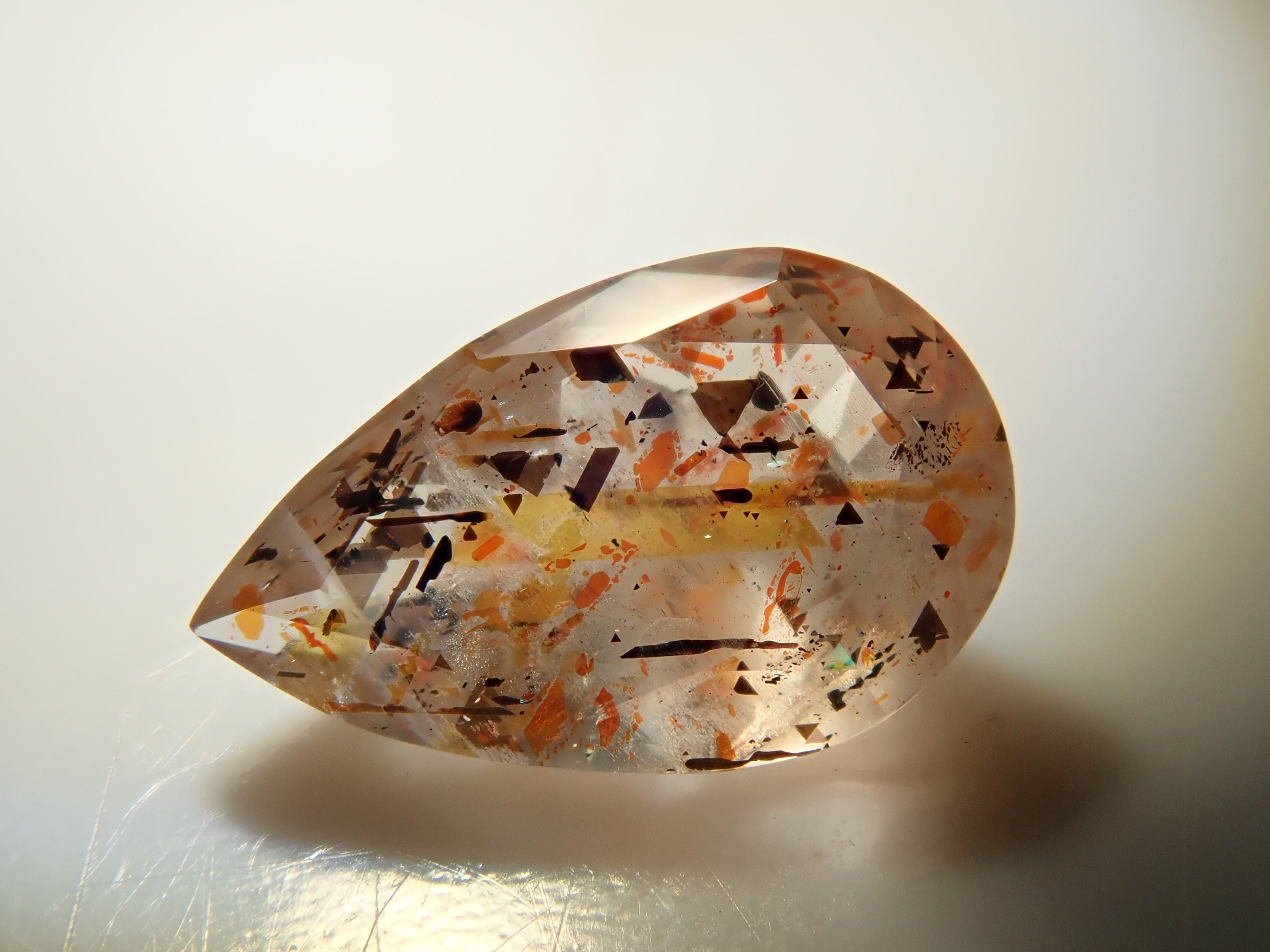 【12562049掲載】オーストラリア産レインボーラティスサンストーン 0.373ctルース