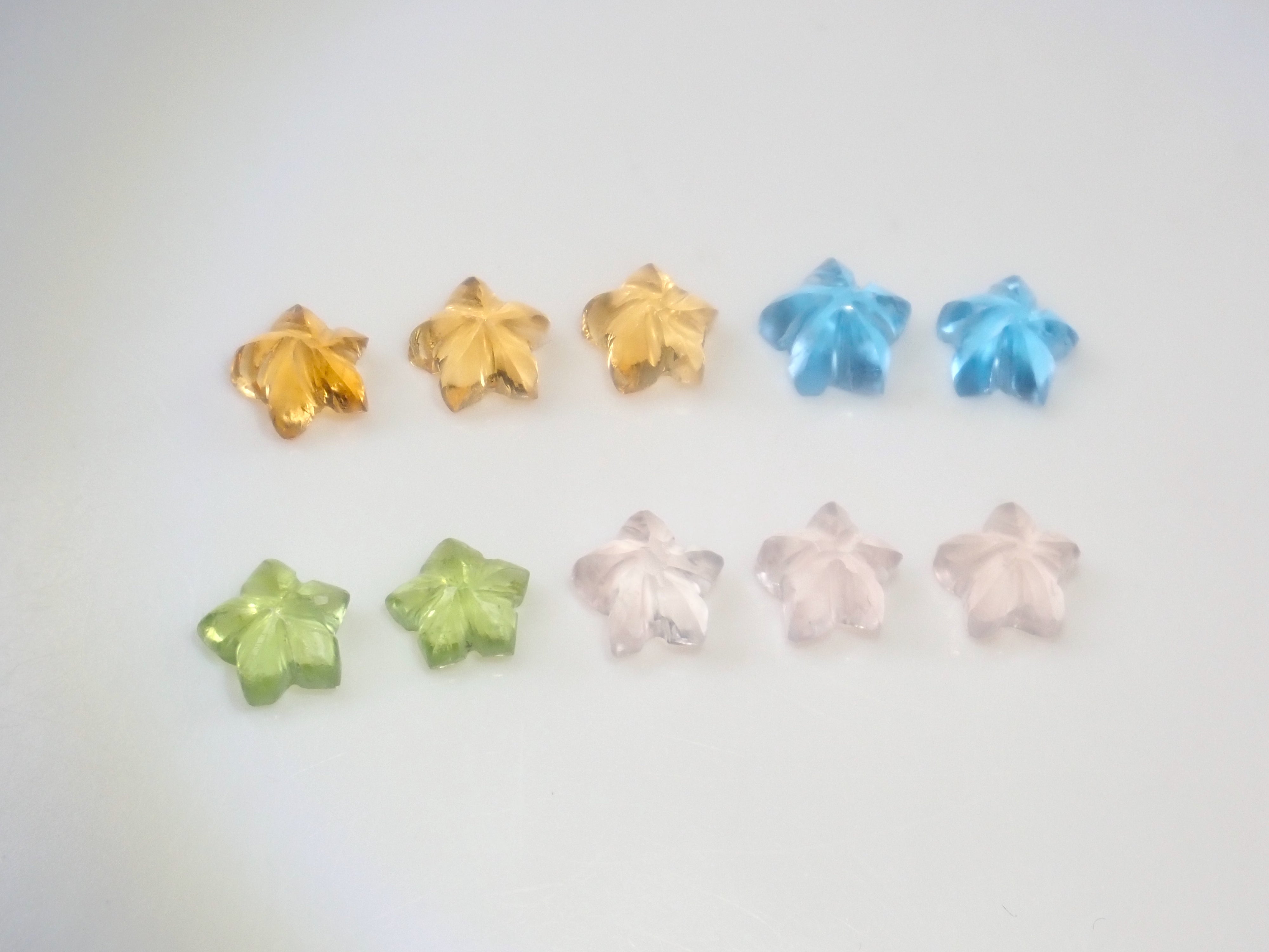 【3/28 22時販売】《限定10石》プルメリアカットのカービング(ペリドット、ブルートパーズ、シトリン、ローズクォーツ) 1石《複数購入割引有》