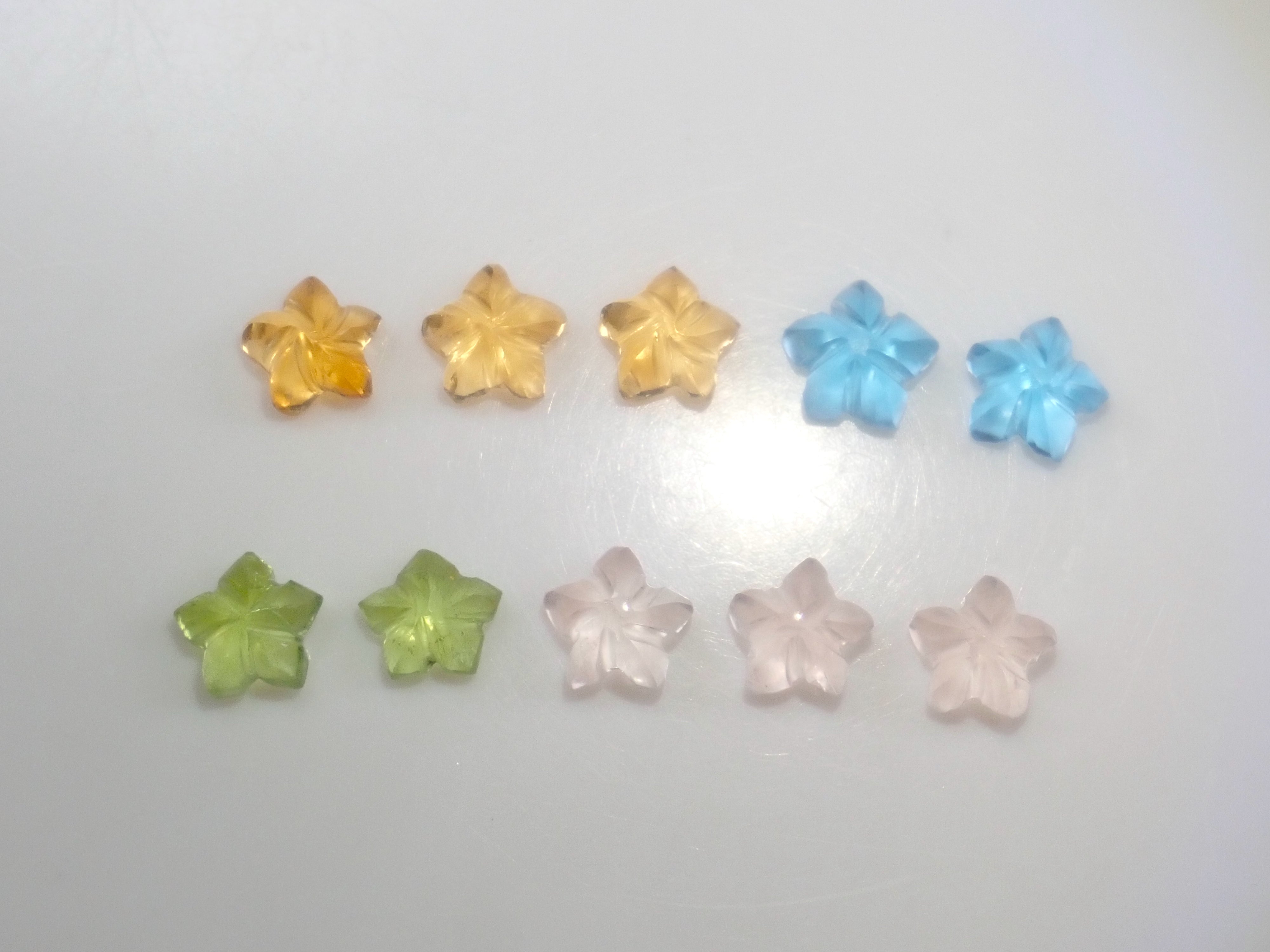 【3/28 22時販売】《限定10石》プルメリアカットのカービング(ペリドット、ブルートパーズ、シトリン、ローズクォーツ) 1石《複数購入割引有》