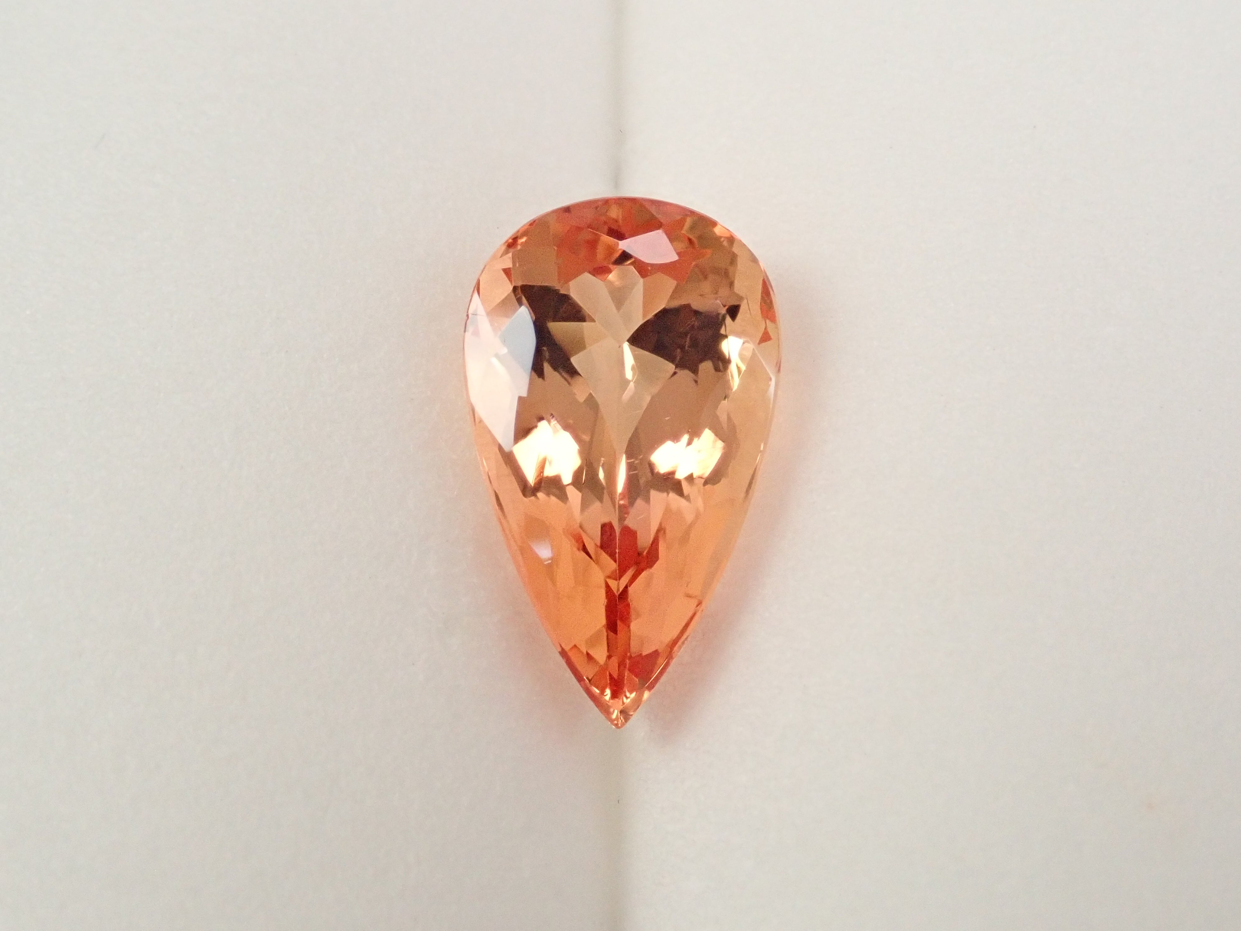 【12562595掲載】ブラジル産インペリアルトパーズ 3.999ctルース