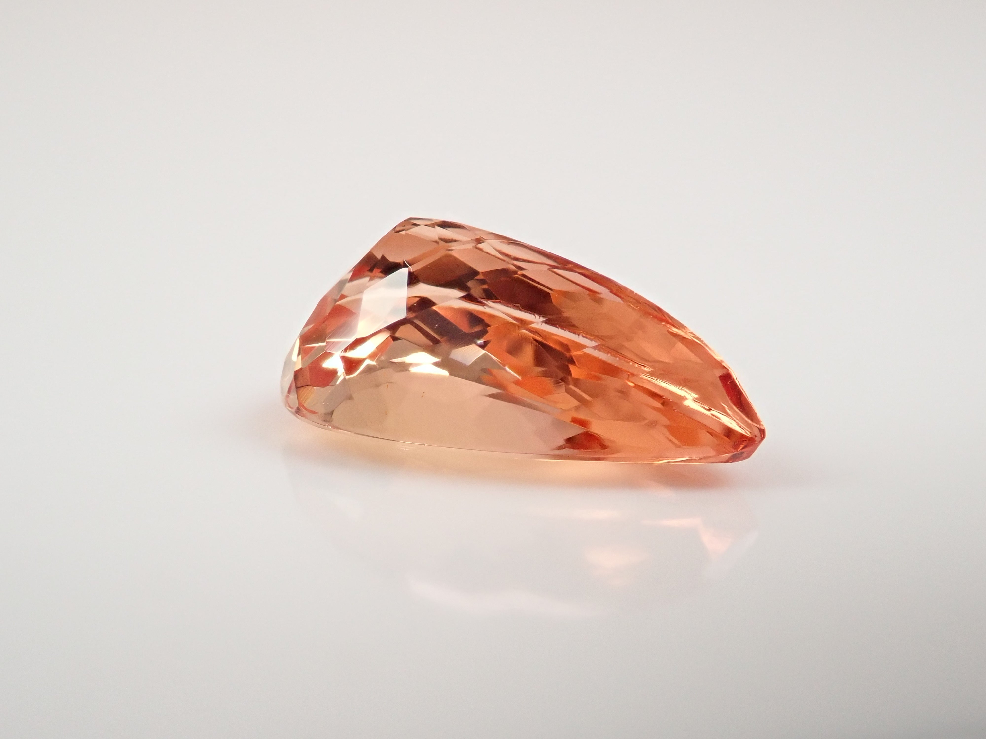 【12562595掲載】ブラジル産インペリアルトパーズ 3.999ctルース