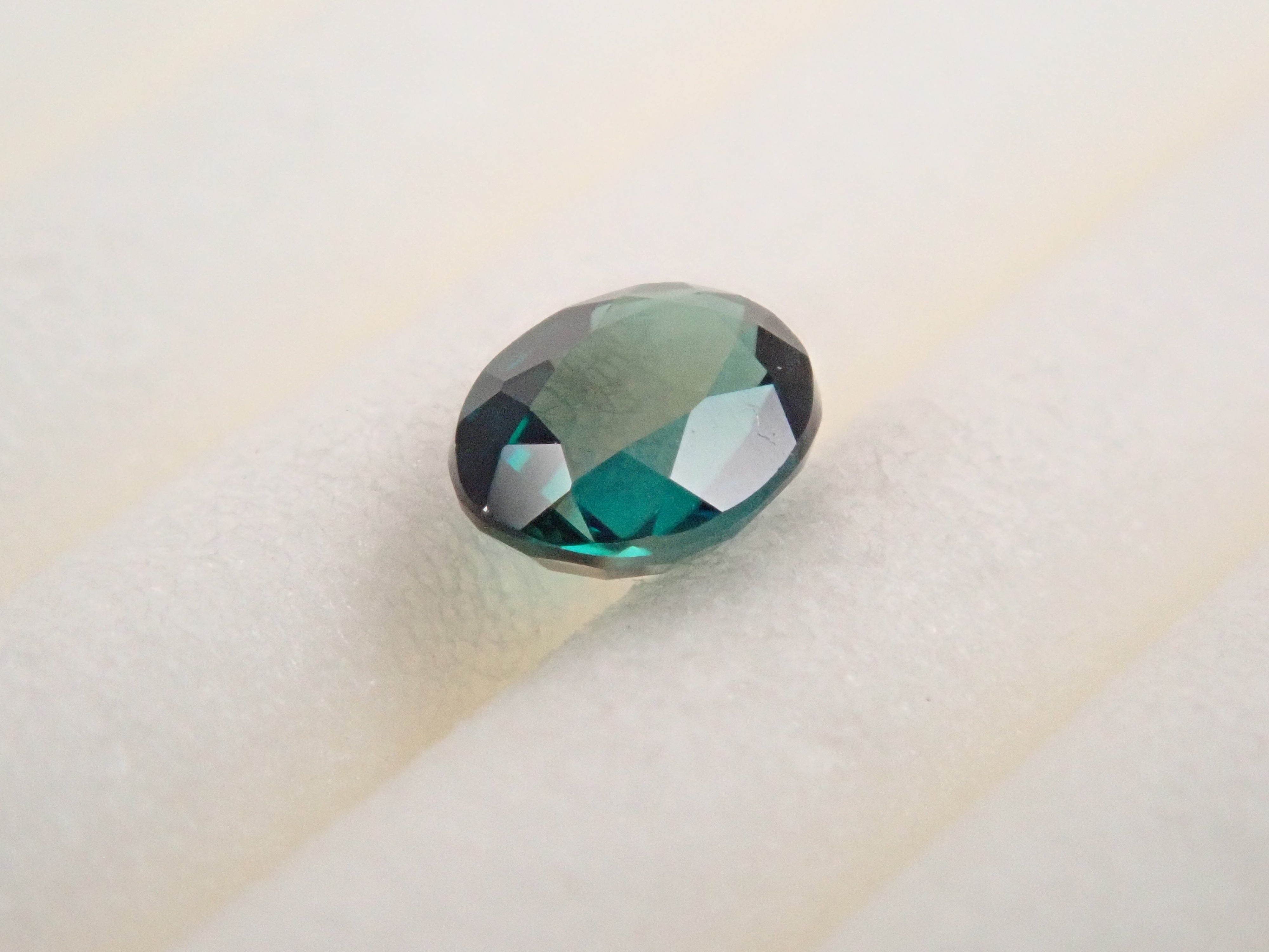 【12562657掲載】マダガスカル産グランディディエライト 0.163ctルース