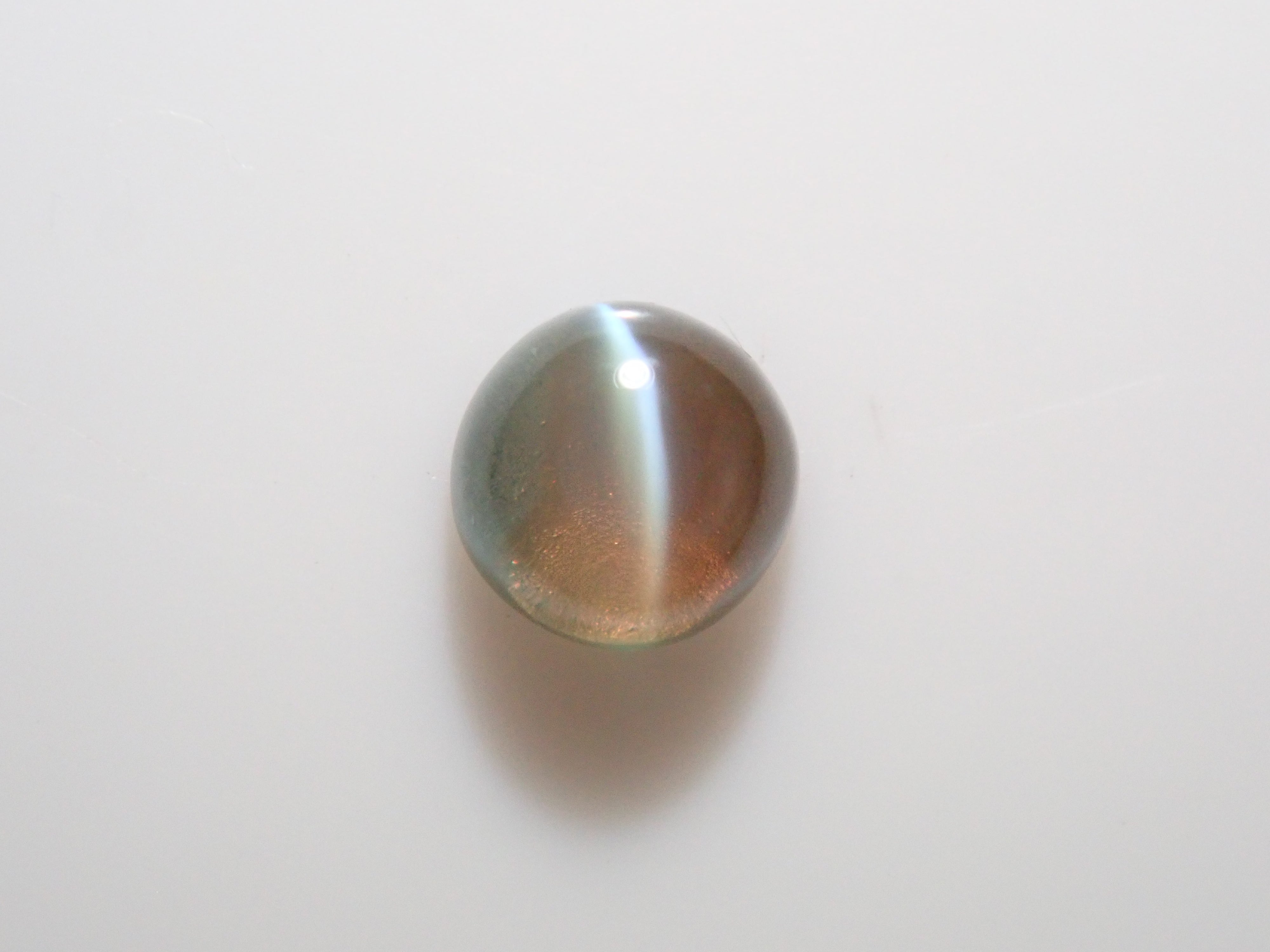 【12562658掲載】ブラジル産アレキサンドライトキャッツアイ 0.097ctルース